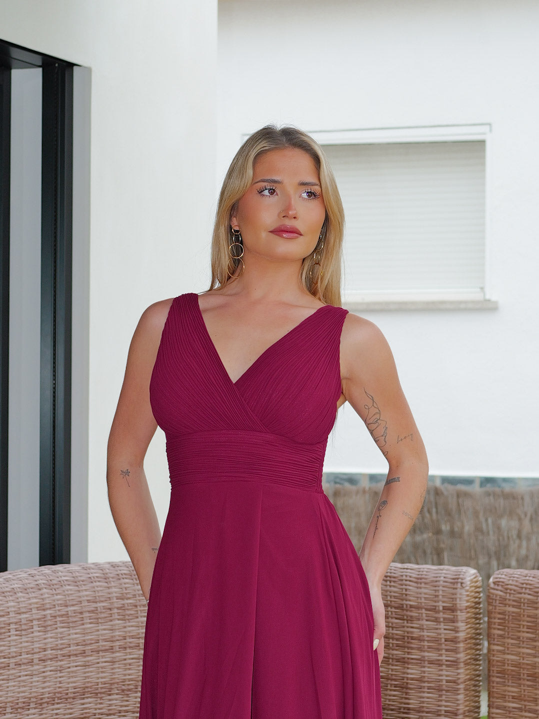 Long burgundy dress with draped V-neckline