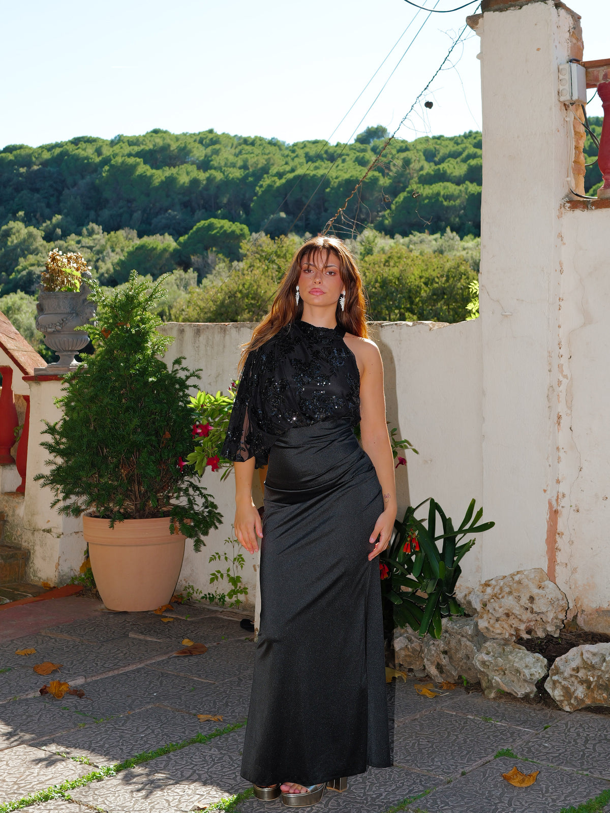 Black asymmetrical dress with puffed sleeves and sequins