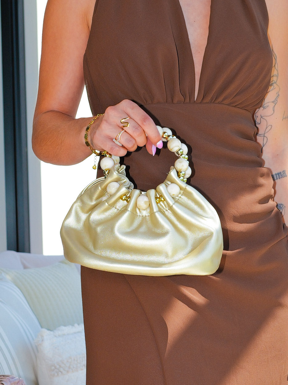 Clutch bombonera asa dorado