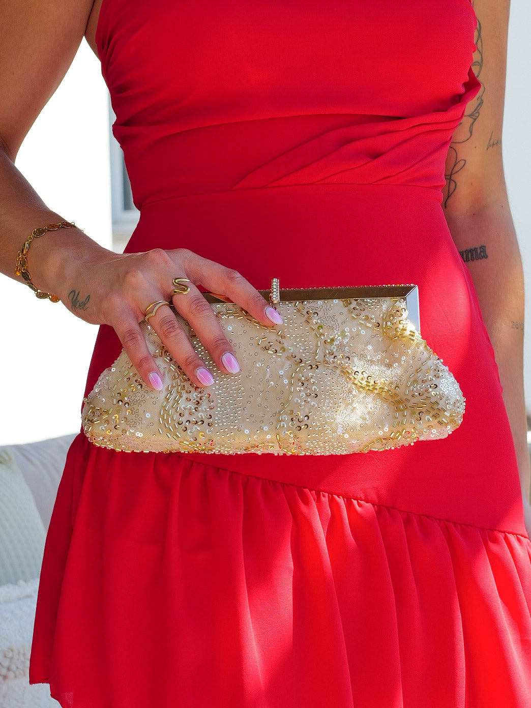 Clutch bombonera lentejuelas dorado