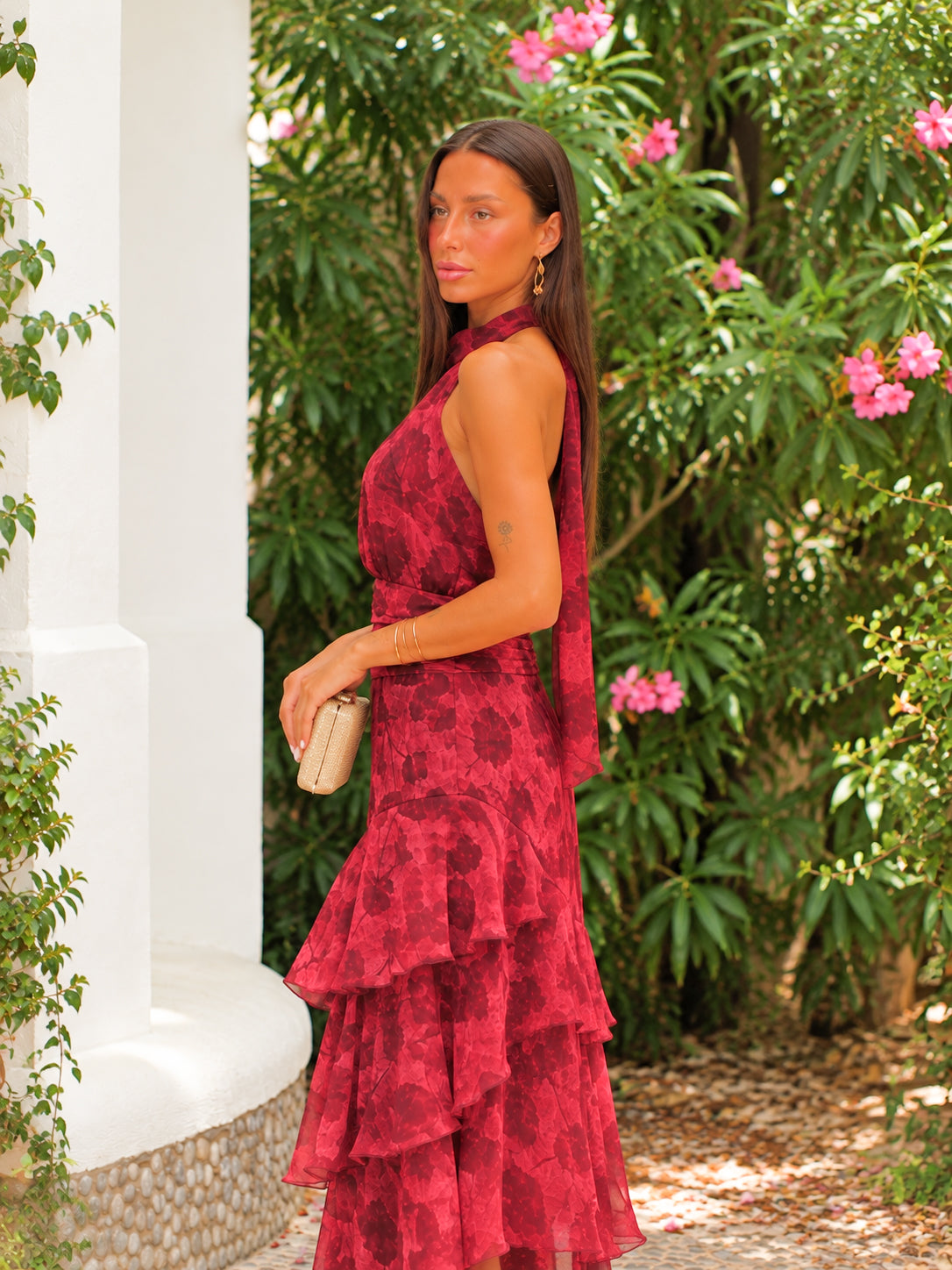 Red midi dress with a halter neckline and ruffles