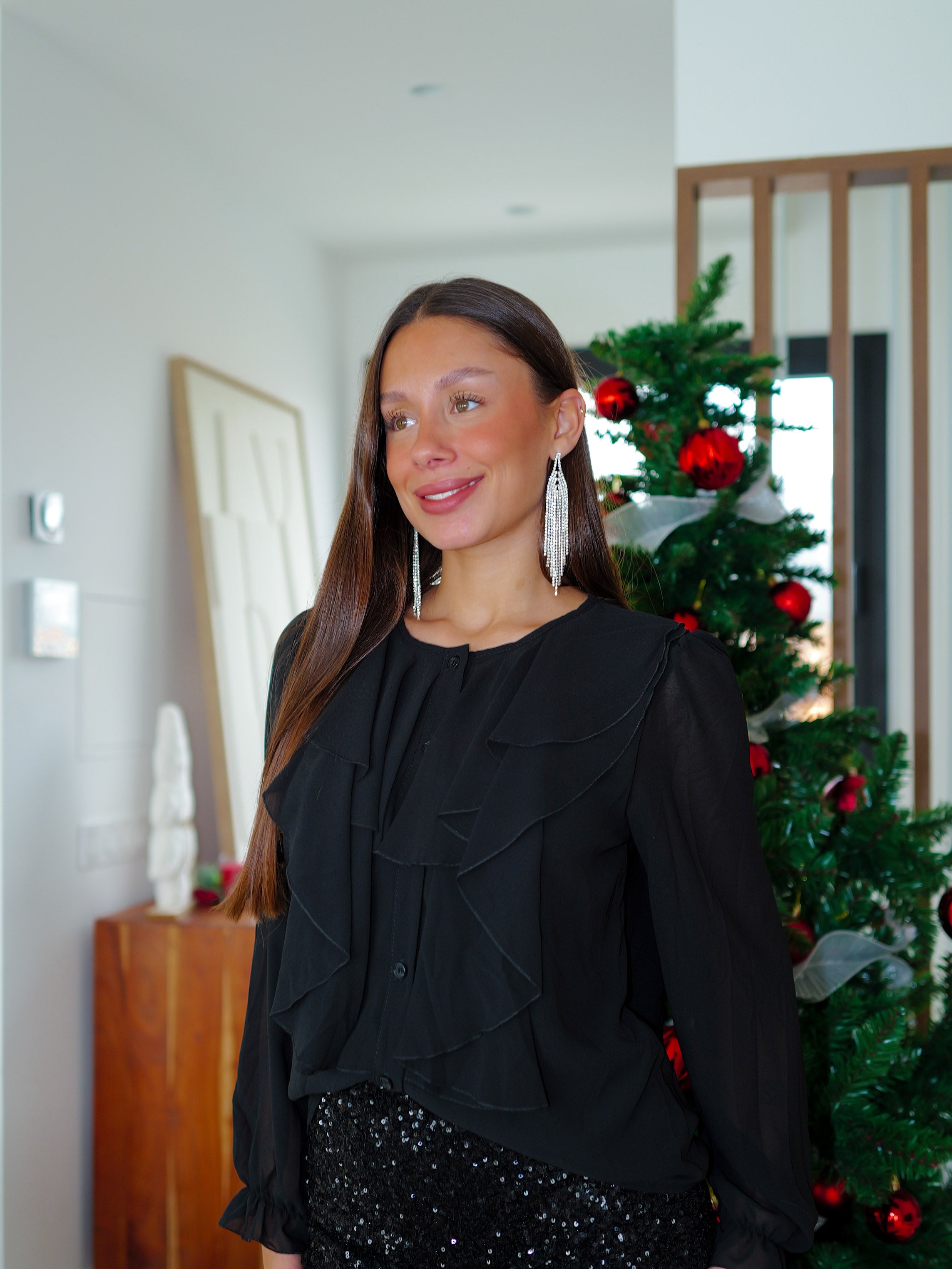 Blusa volante romántica negra