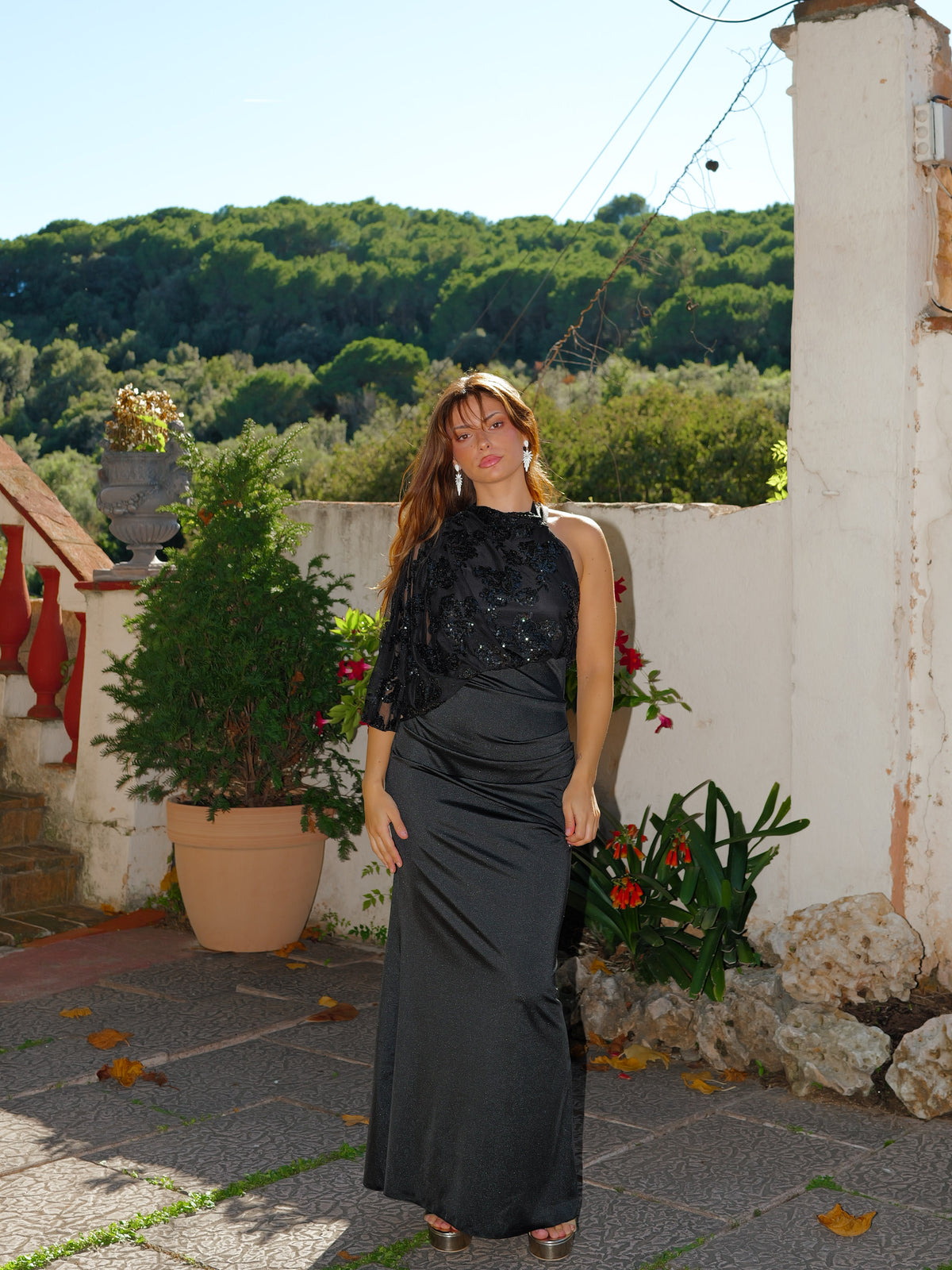 Black asymmetrical dress with puffed sleeves and sequins