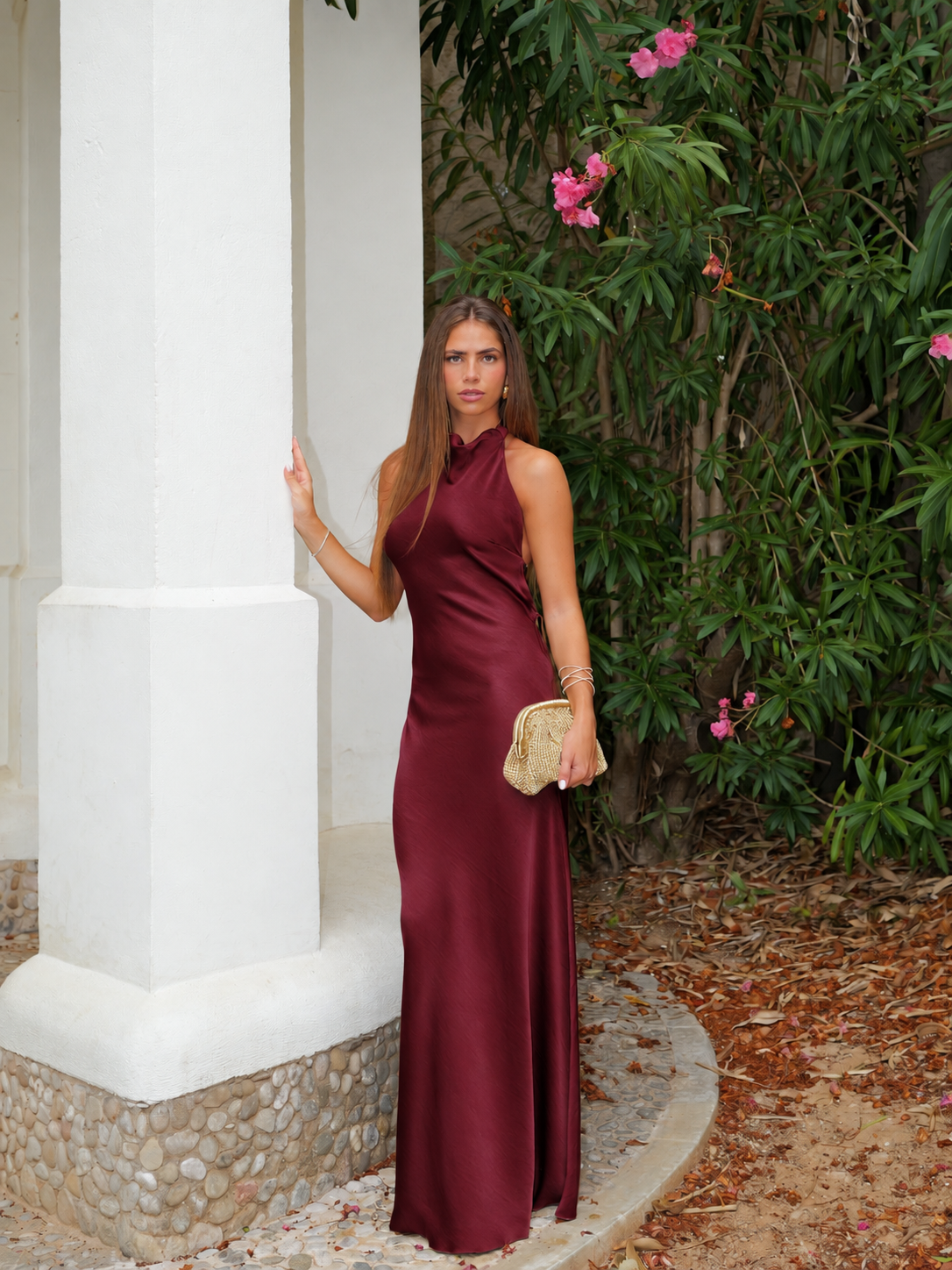 Burgundy satin halter dress with an open back