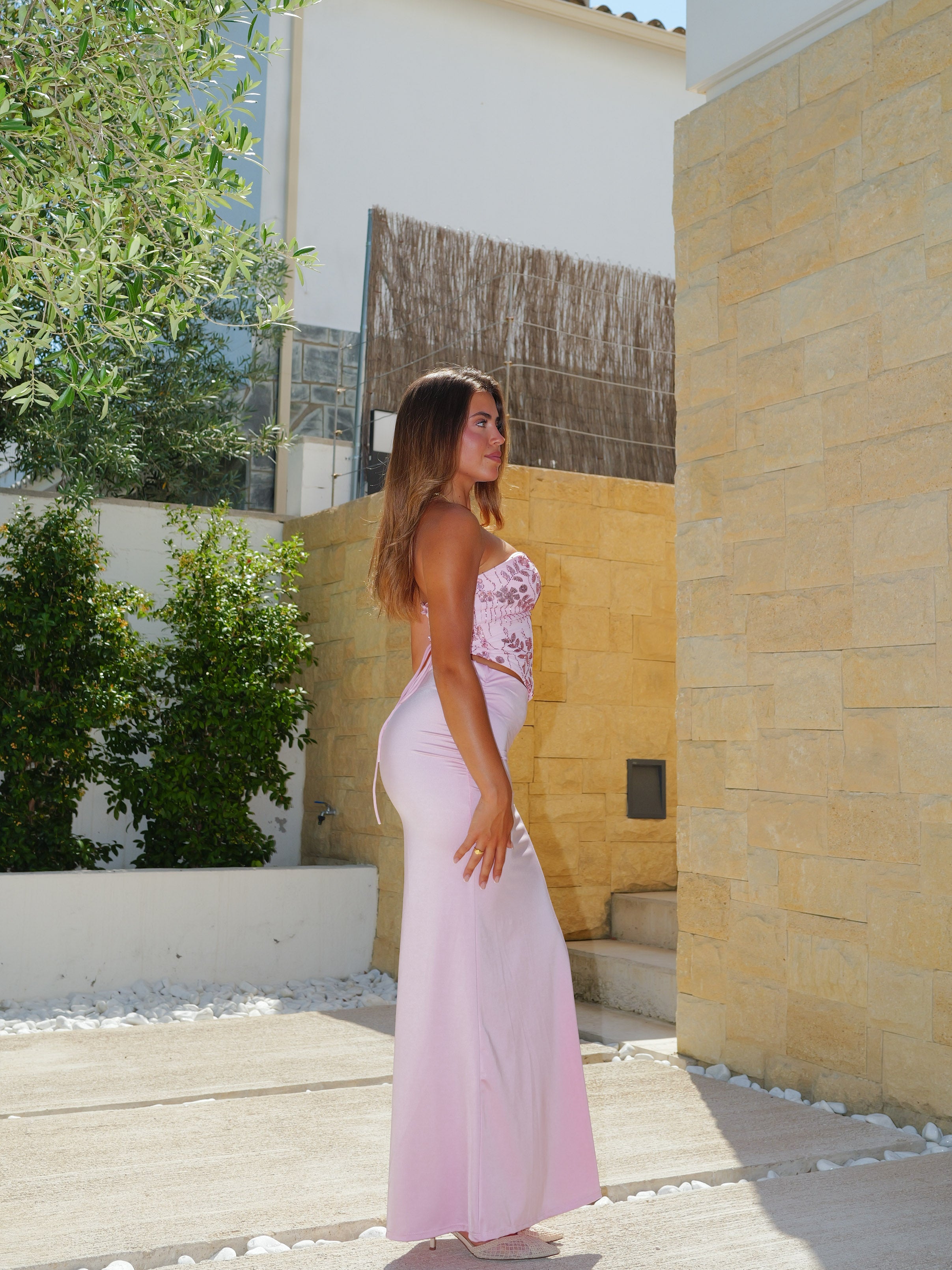 Conjunto top corsé detalles brillo rosa