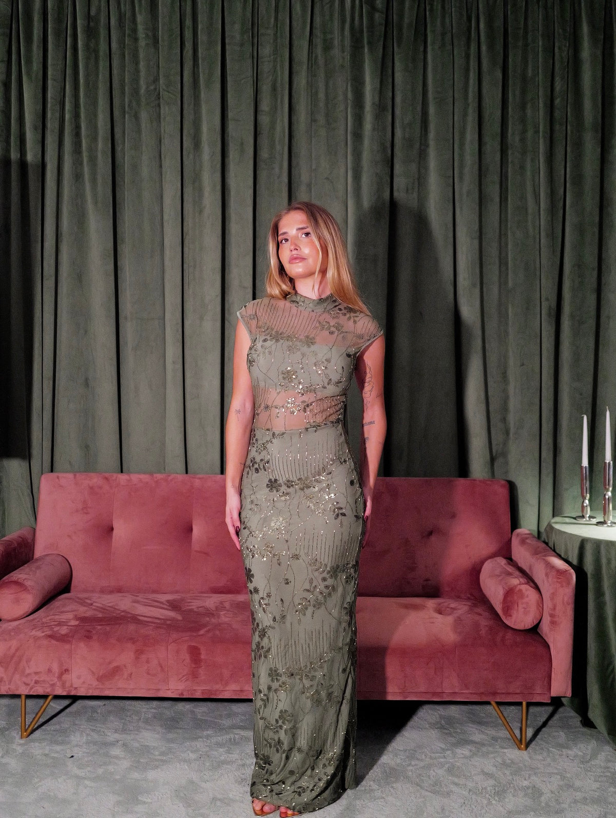 Long, sequined dress with a Perkins neckline in olive
