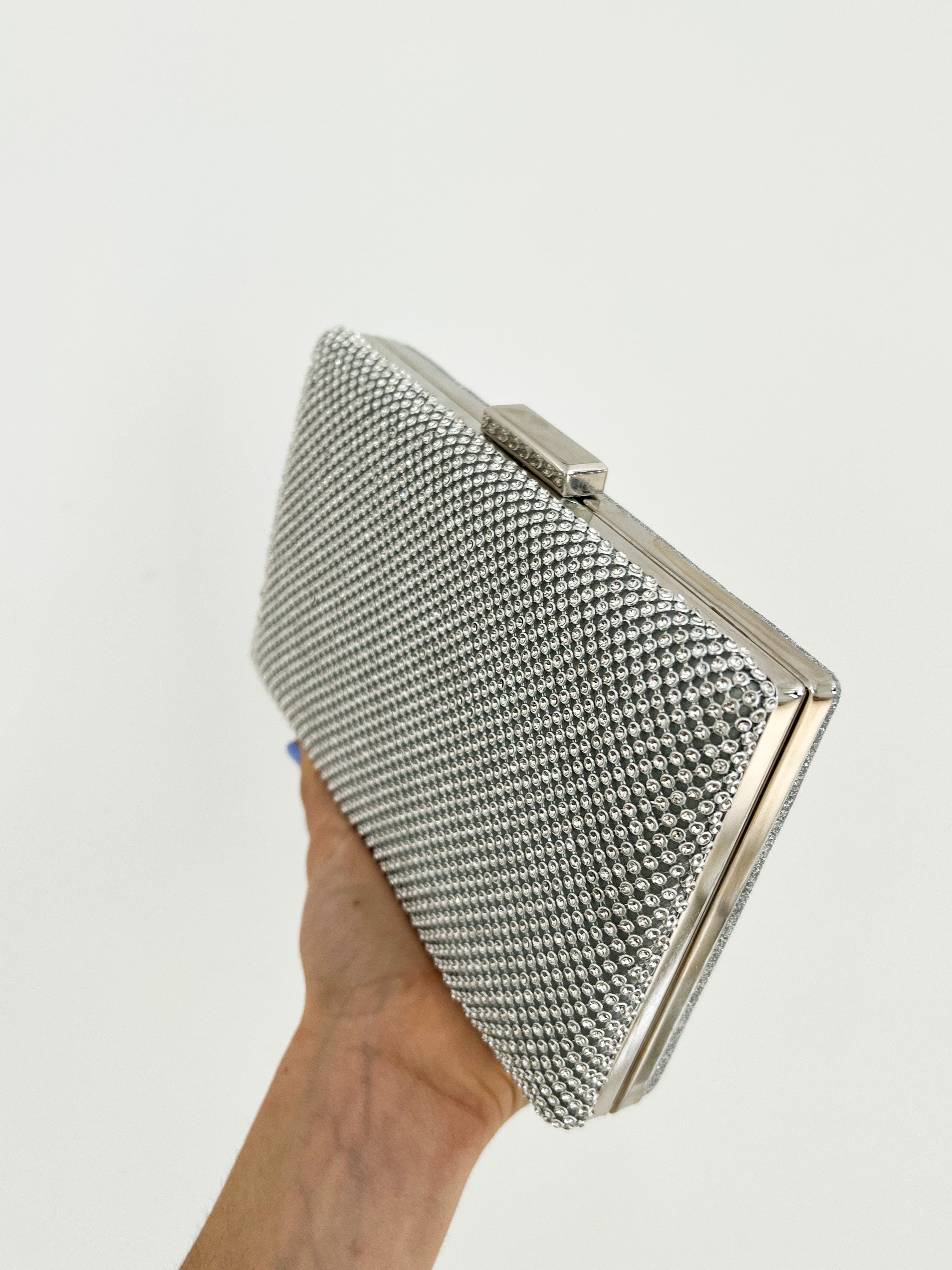 Clutch brillos plateado efecto