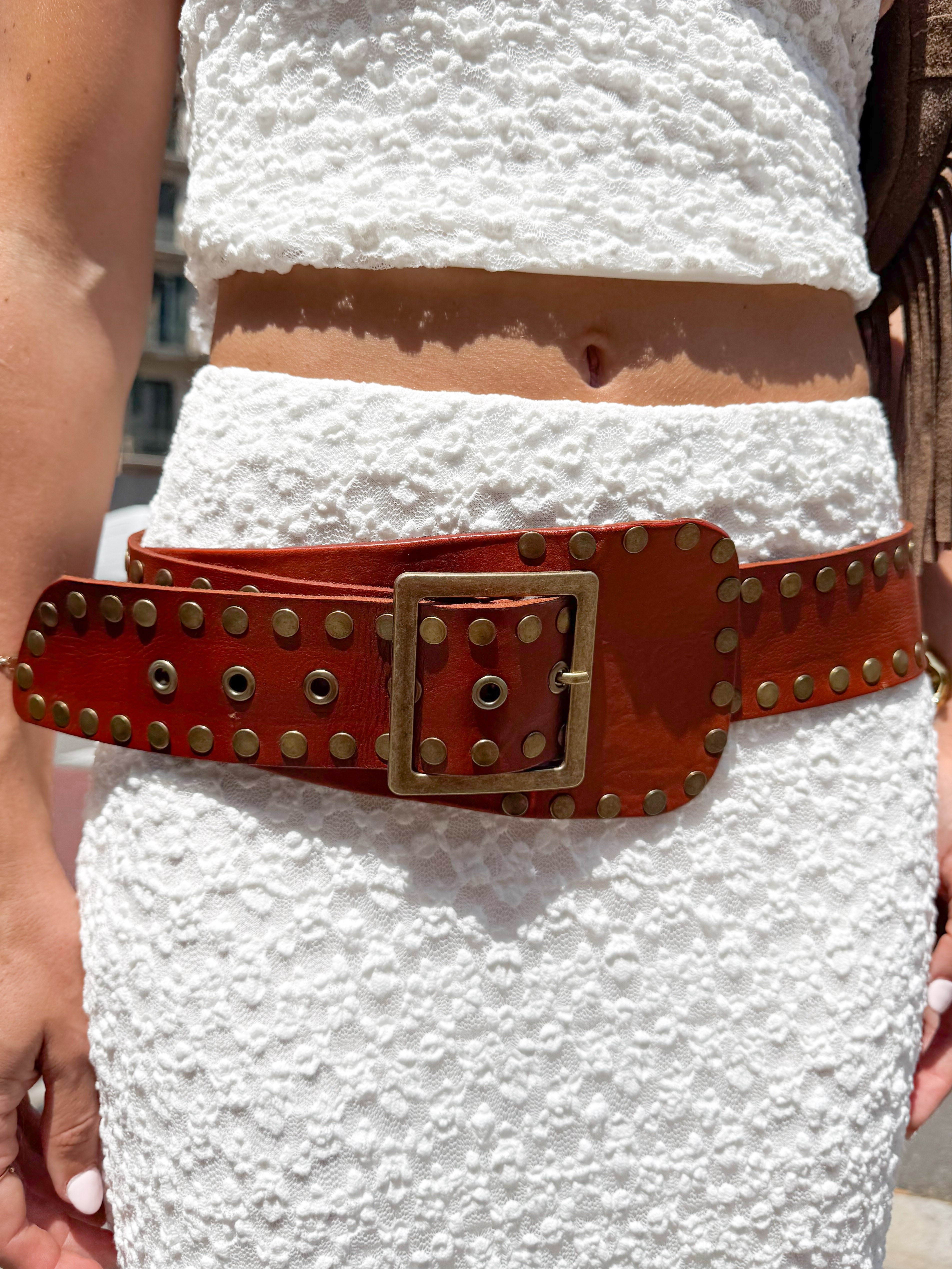 Thick brown studded belt
