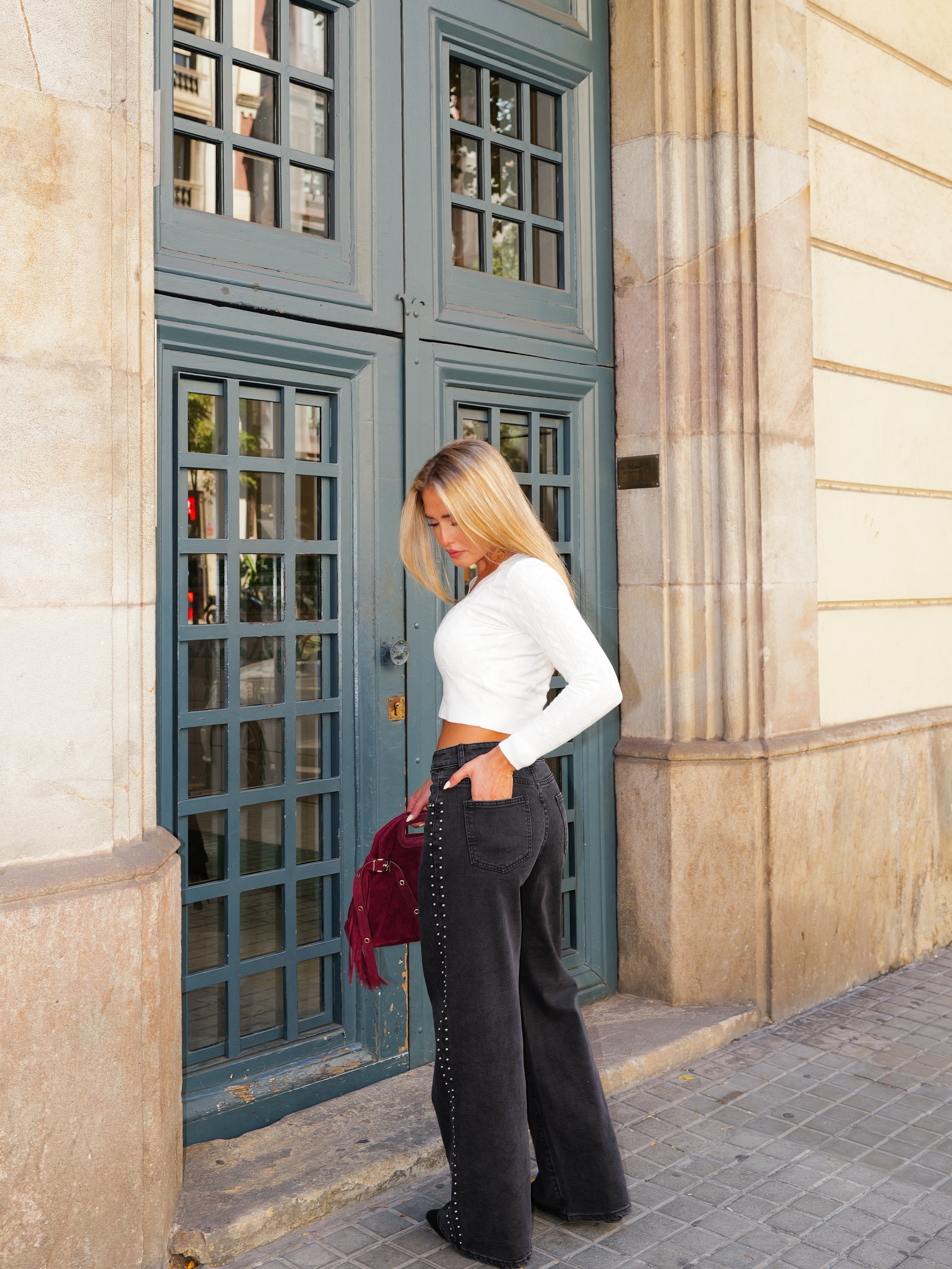 Black studded denim pants