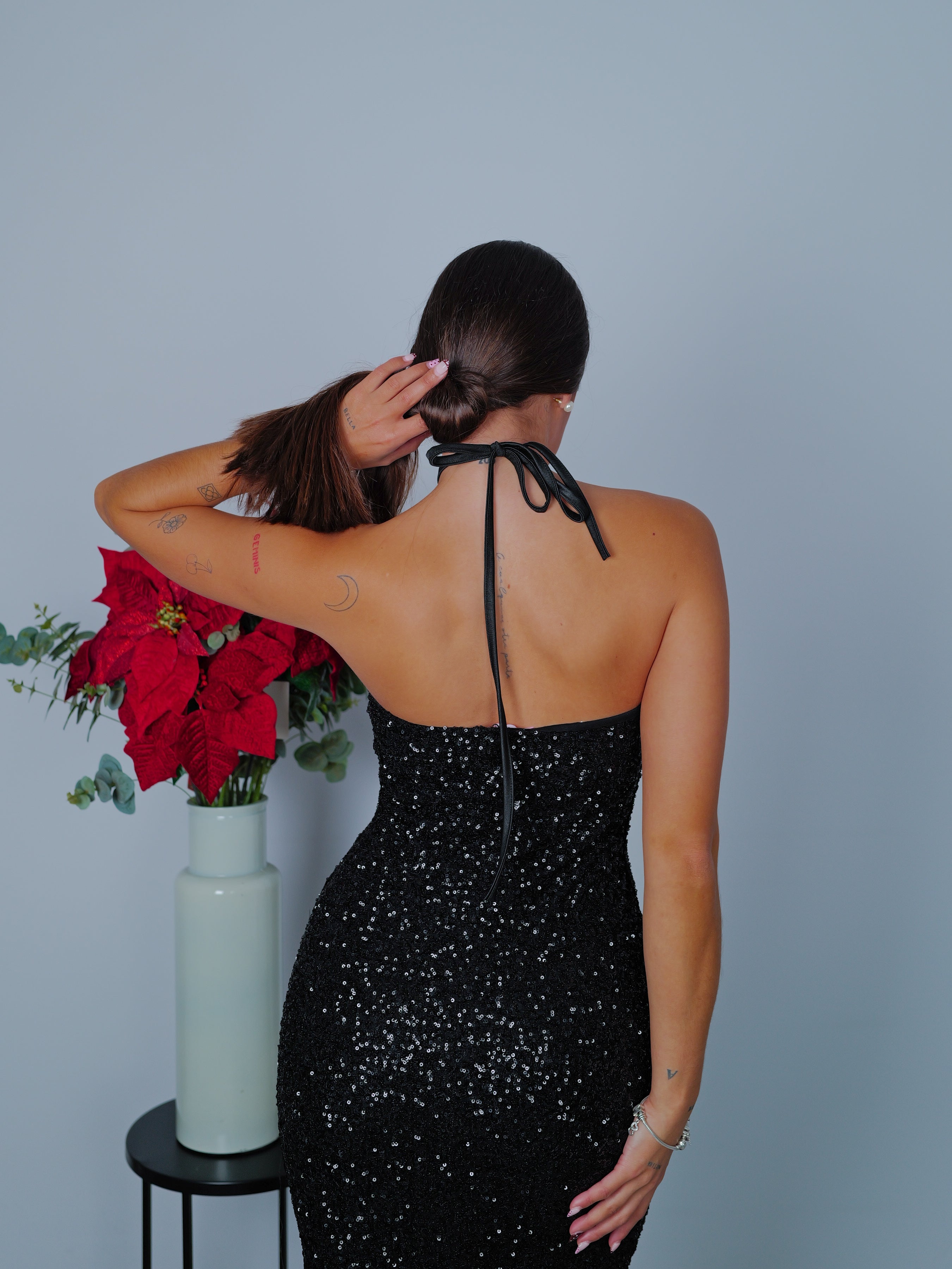 Black halter length glitter dress