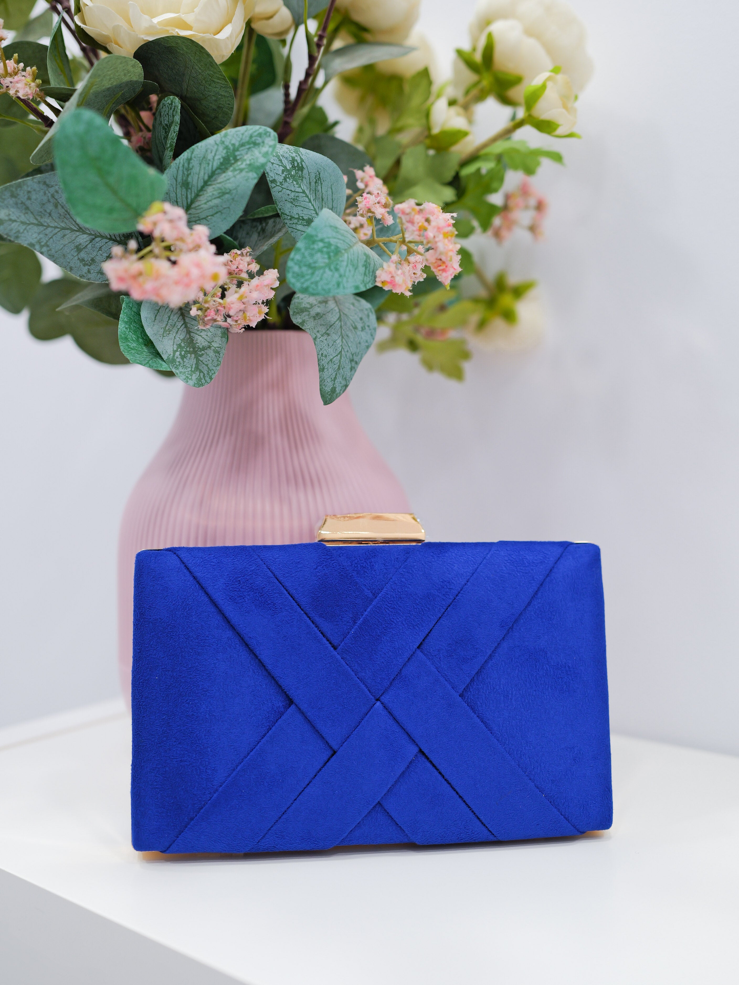 Braided klein clutch