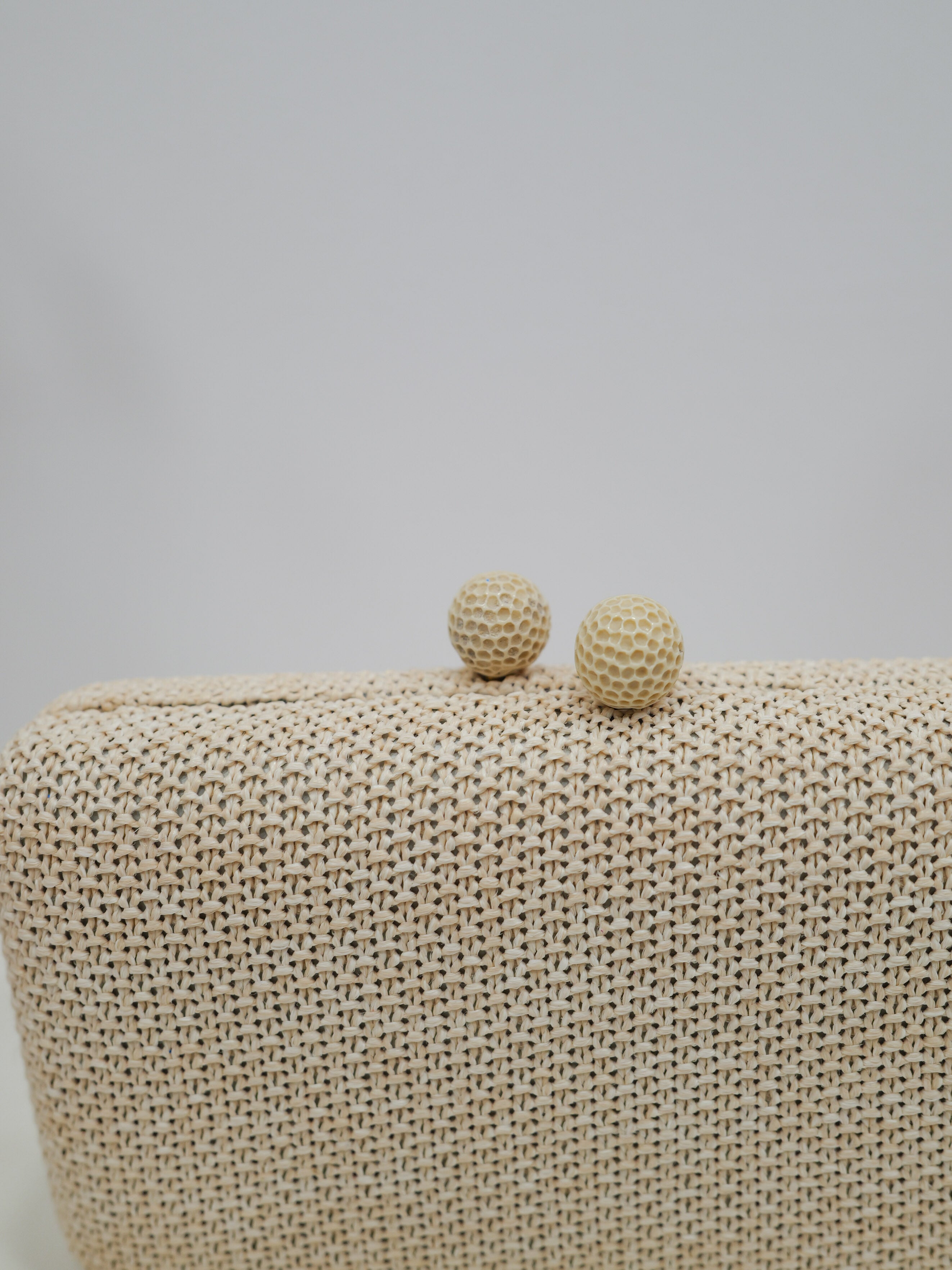 Beige raffia effect party clutch