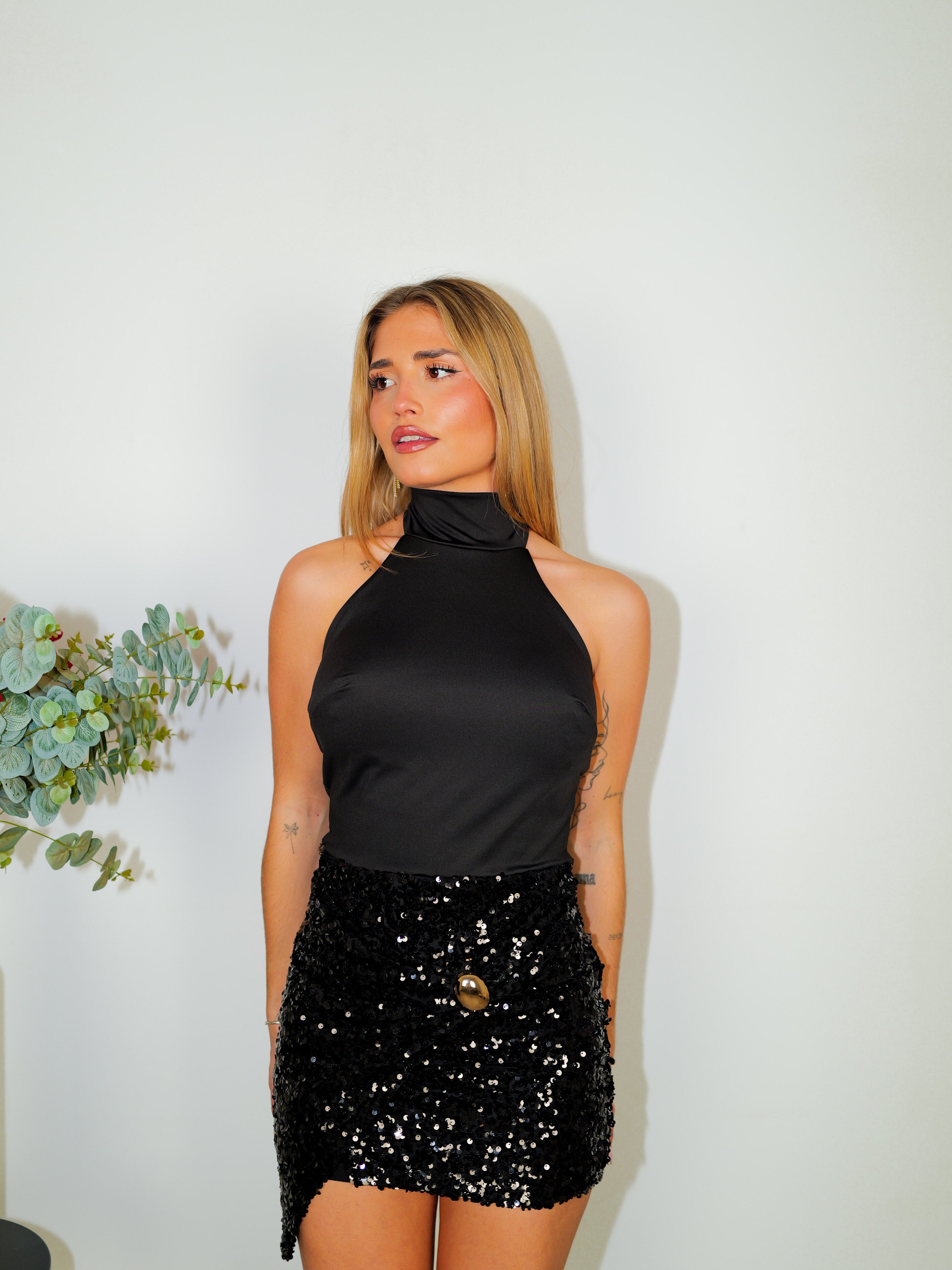 Mini robe dos nu jupe pailletée noire