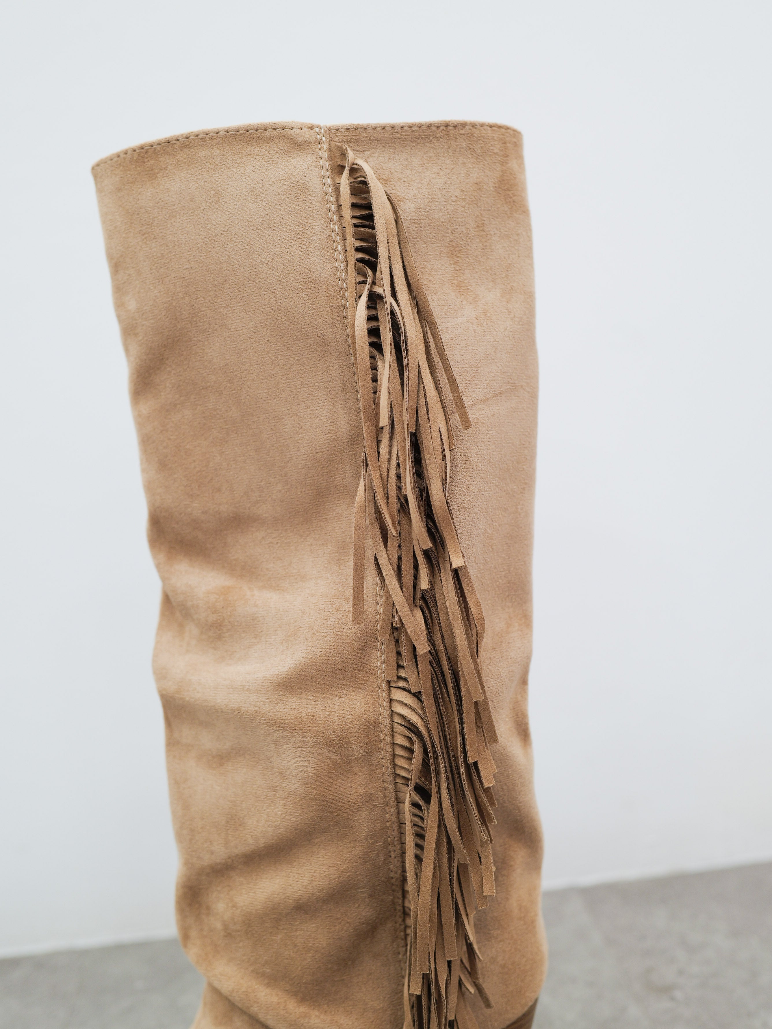 Bottes de cow-boy beige à franges latérales