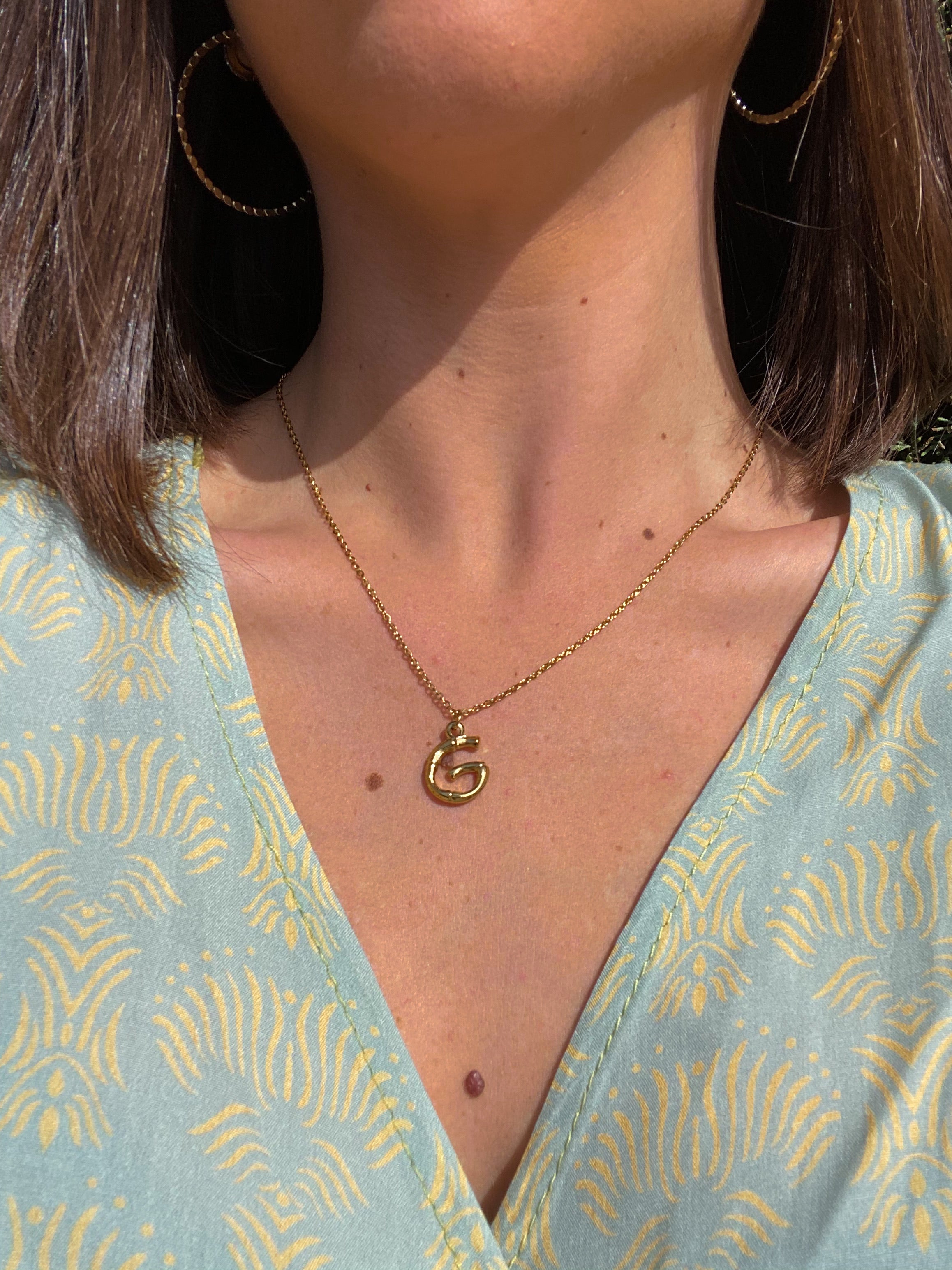 PENDENTIF initial G