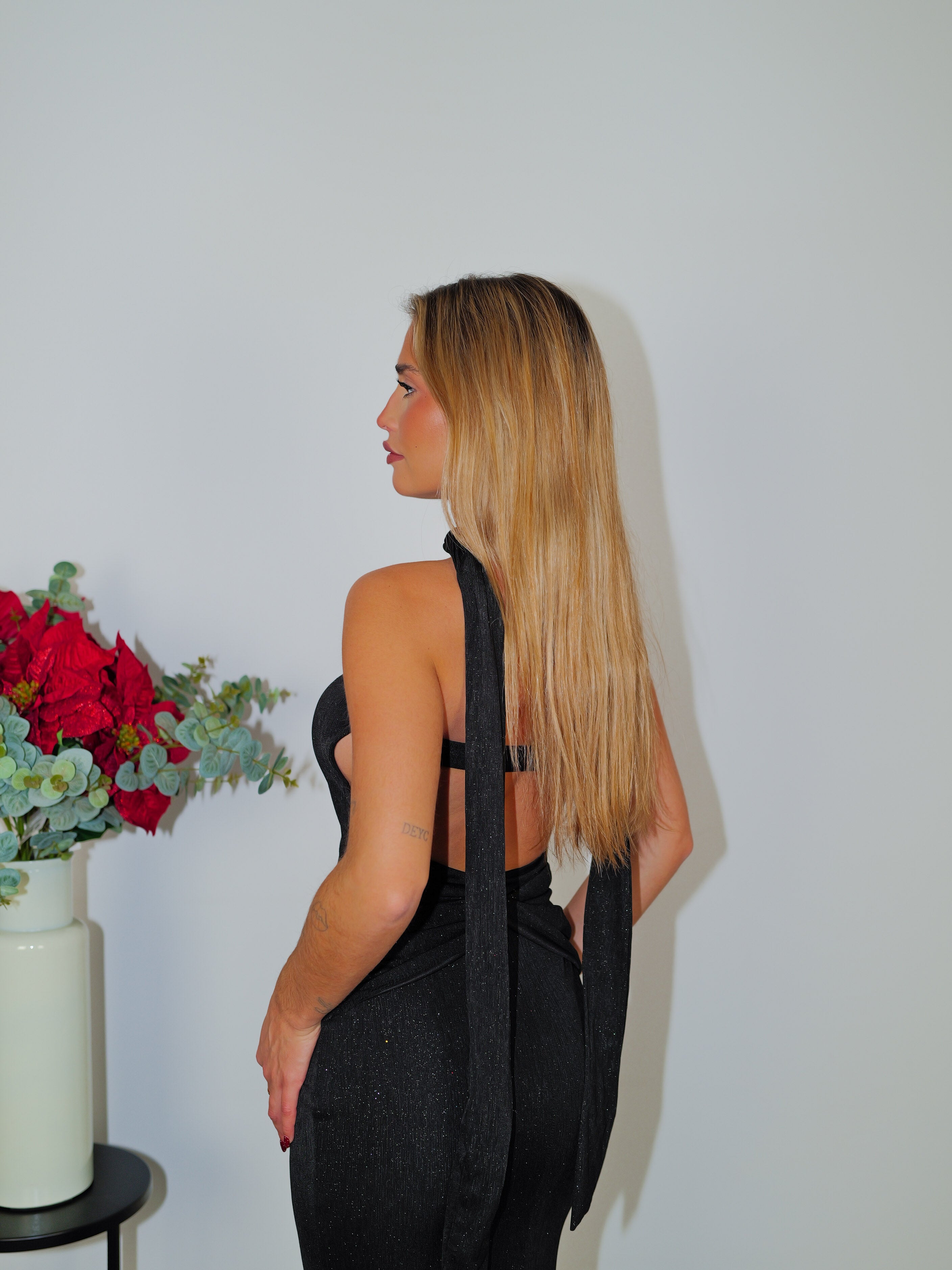Abito con schiena scoperta in lurex nero