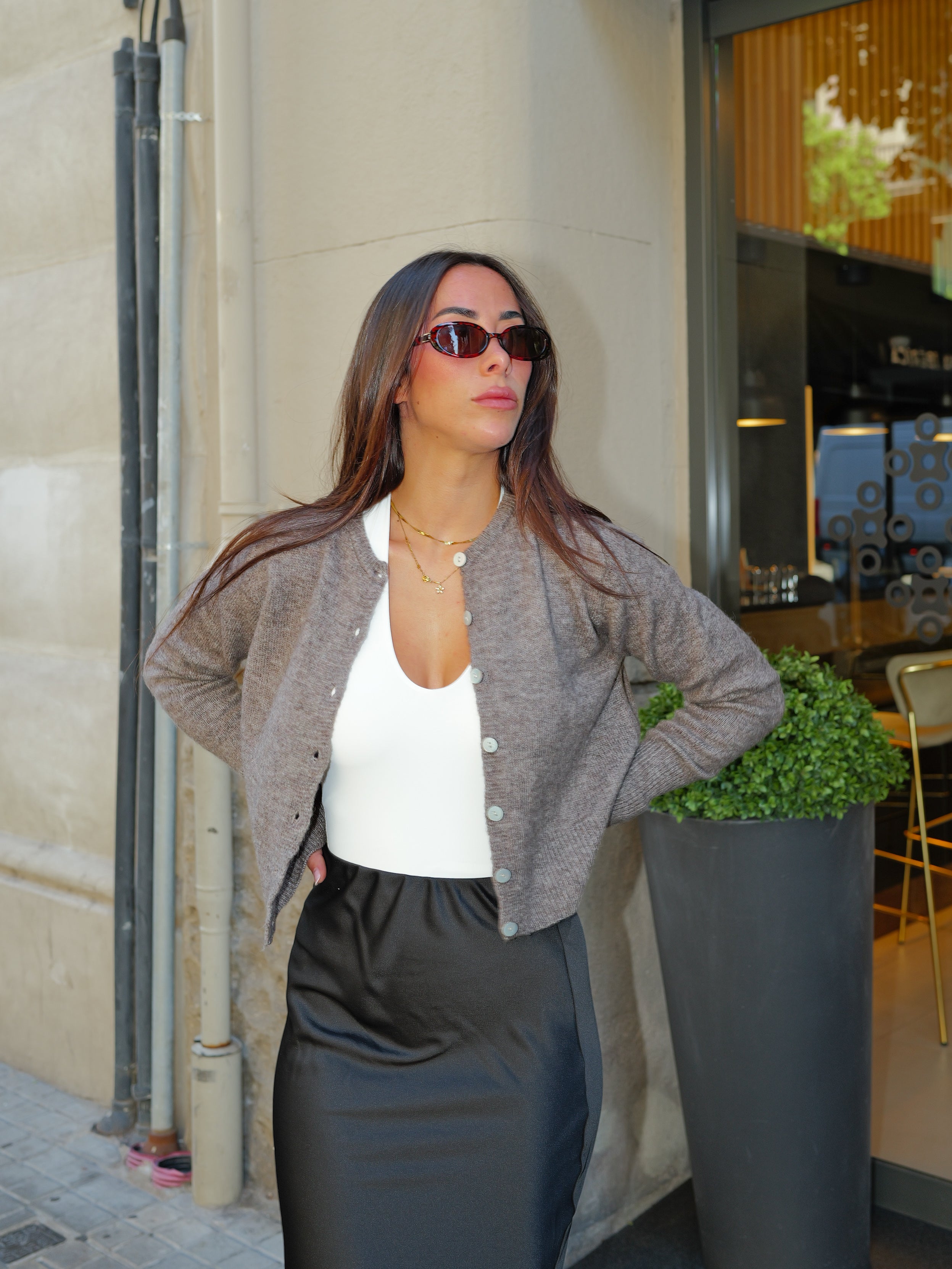 Cardigan in maglia con bottoni in pietra