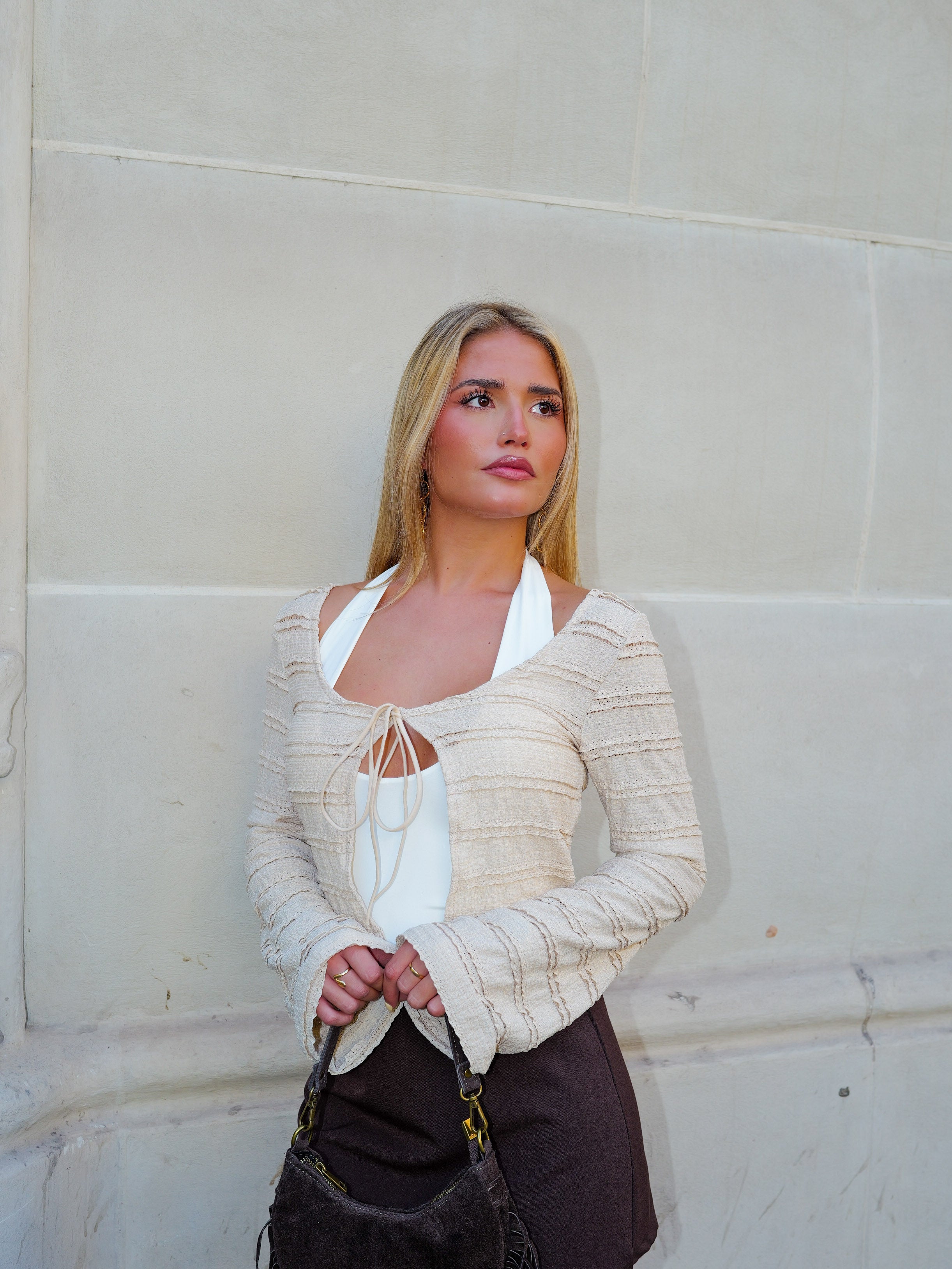 Cardigan con fiocco in pizzo beige