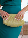 Clutch bombonera brillos dorado