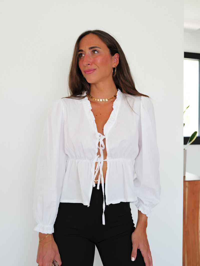 Blusa lazos abertura blanca