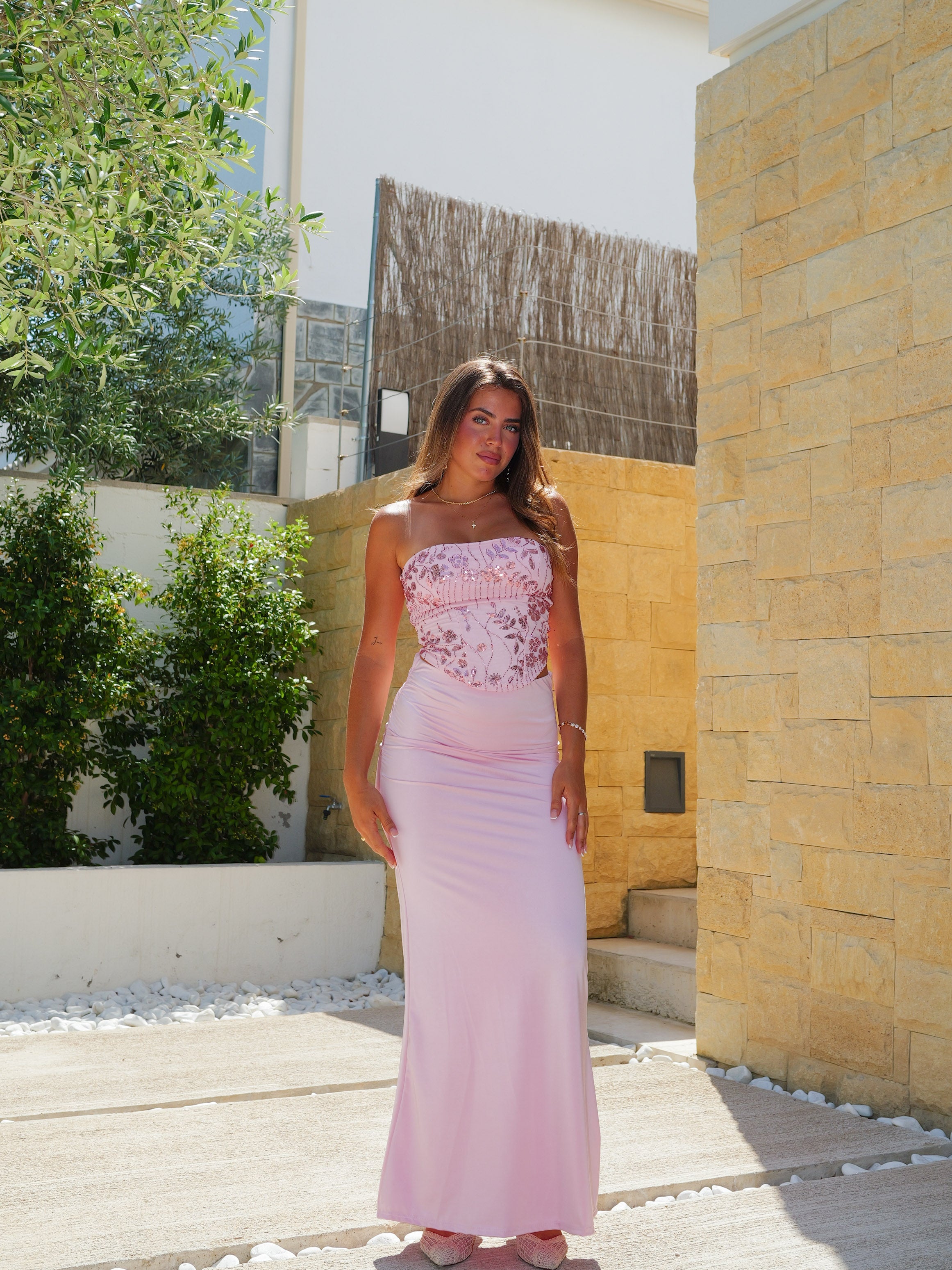 Conjunto top corsé detalles brillo rosa