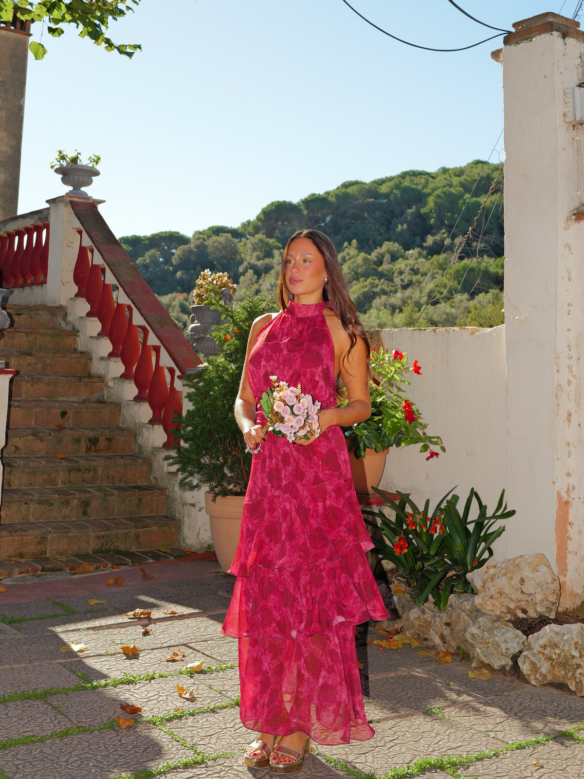 Red midi dress with a halter neckline and ruffles