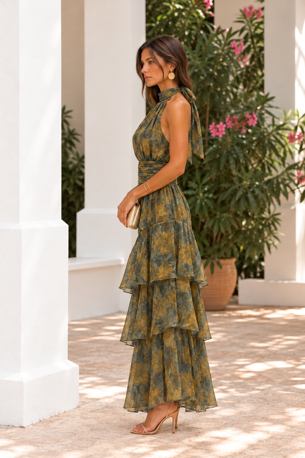 Olive-colored midi dress with a halter neckline and ruffles