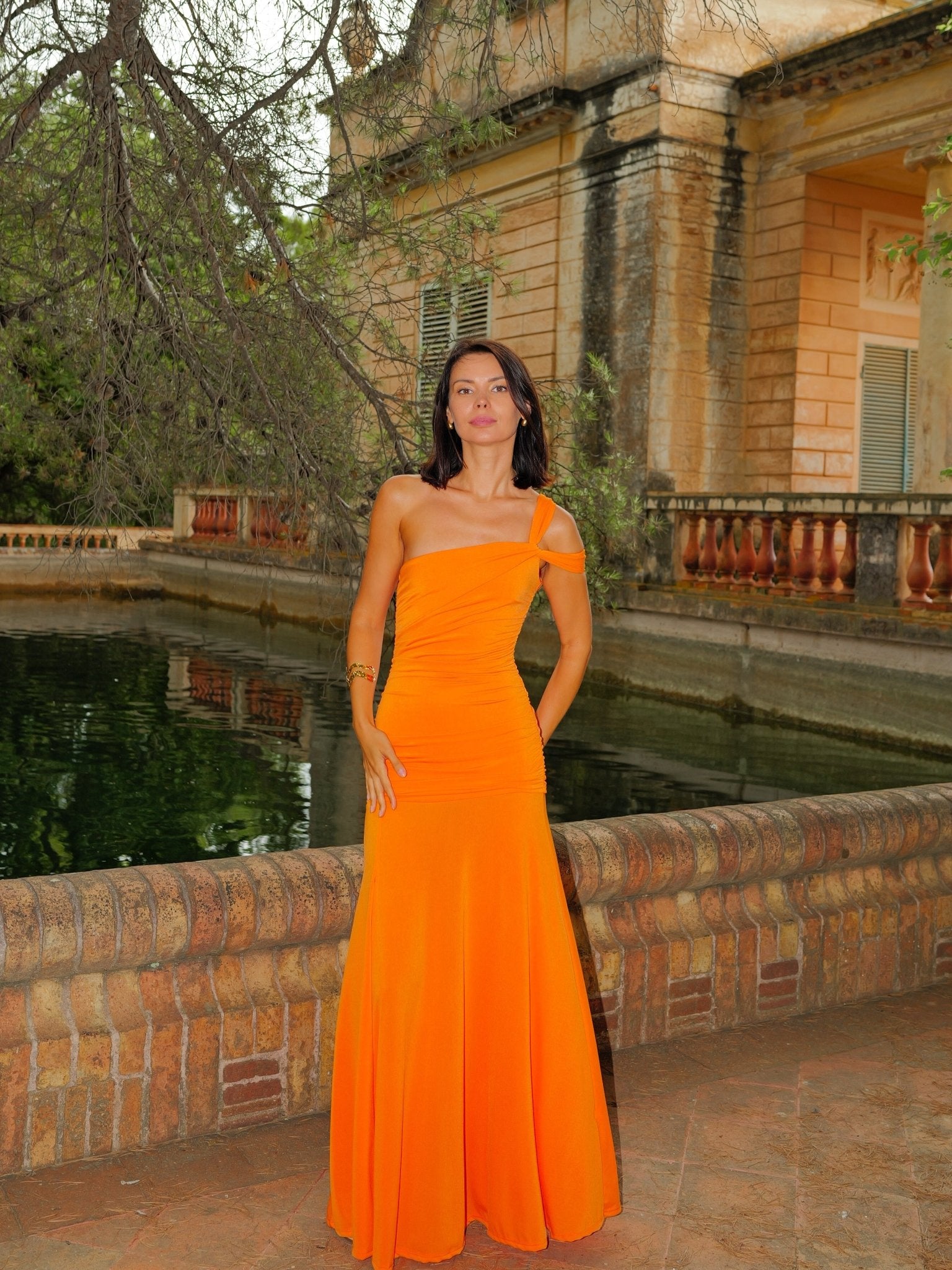 Orange asymmetrical dress with knot detail - SORELLAS