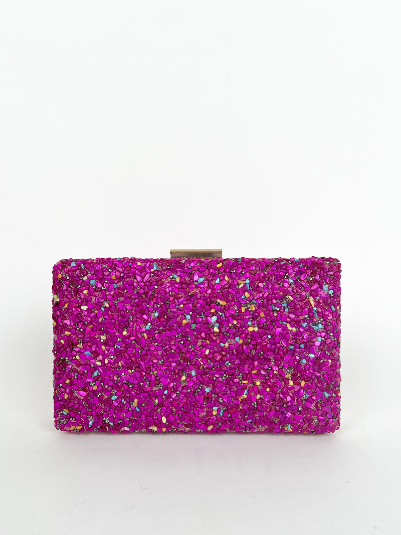 Clutch piedras fucsia