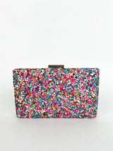 Clutch piedras colores plateado