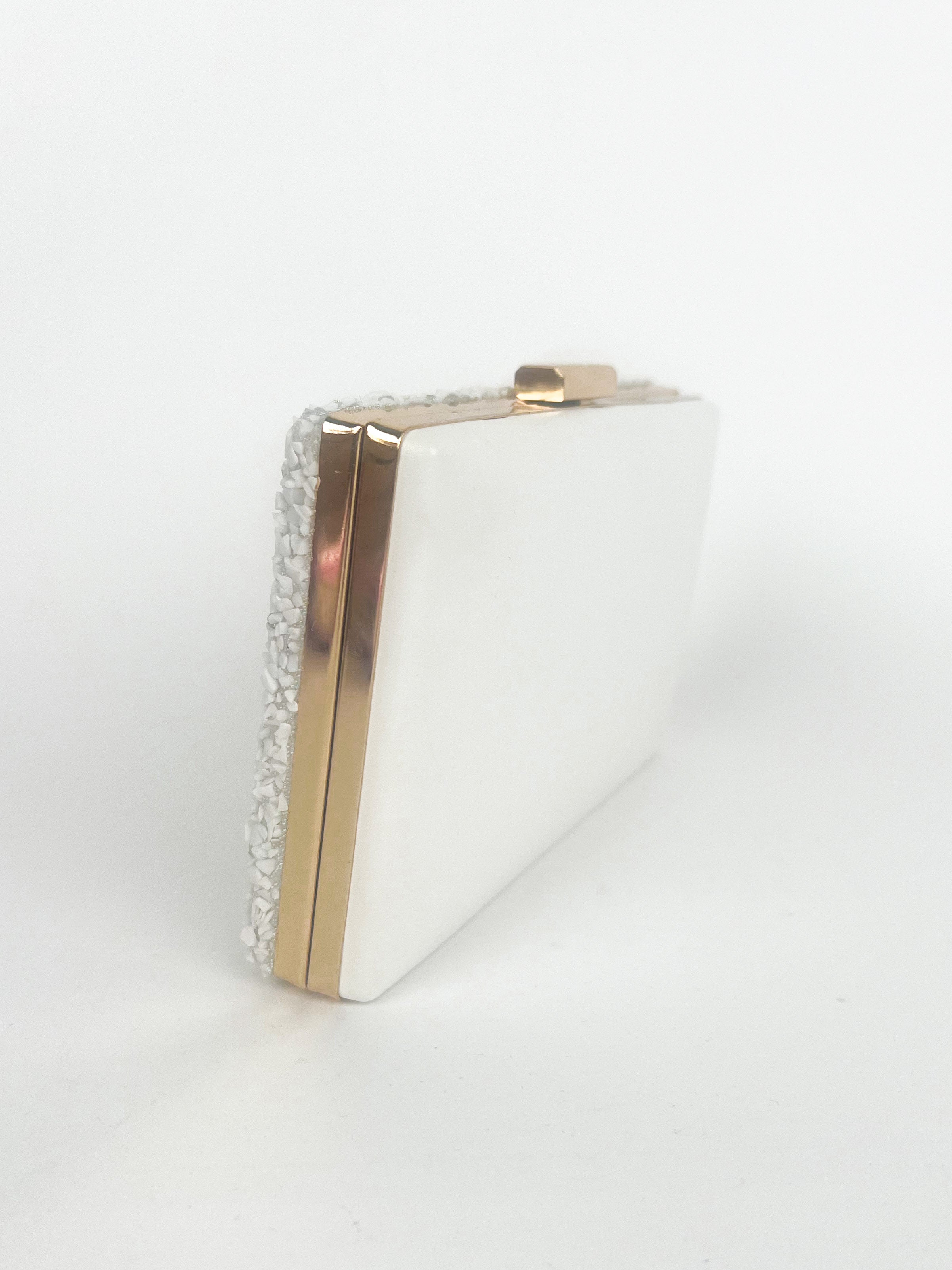 Clutch piedras blanco