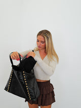 Bolso tachas brillo negro