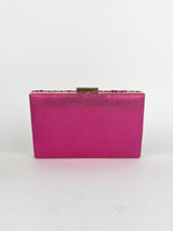 Clutch piedras fucsia