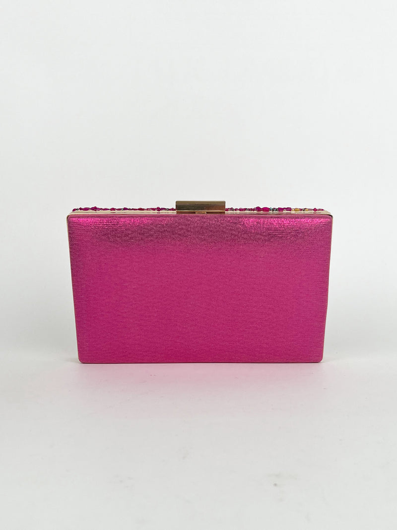 Clutch piedras fucsia