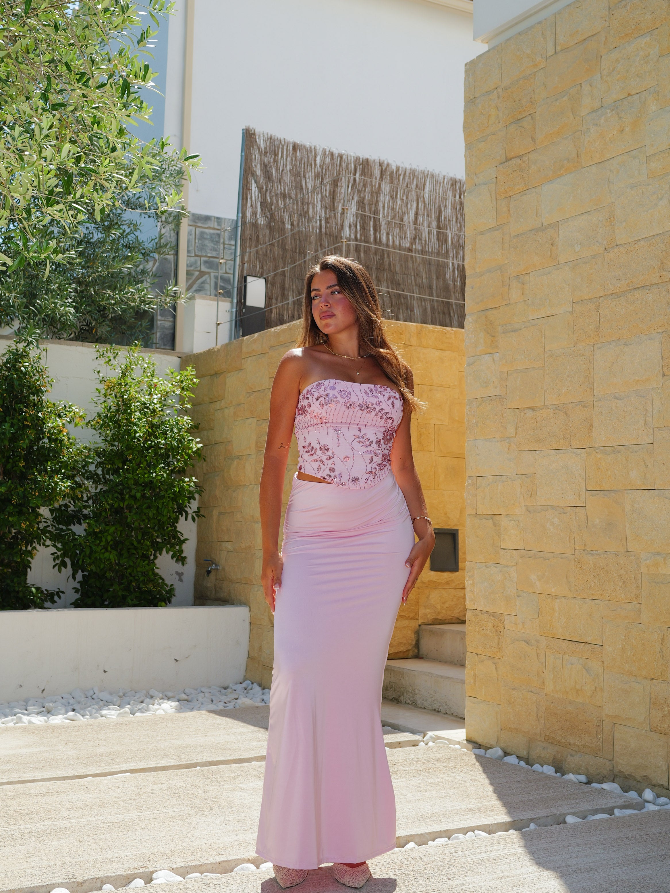 Conjunto top corsé detalles brillo rosa