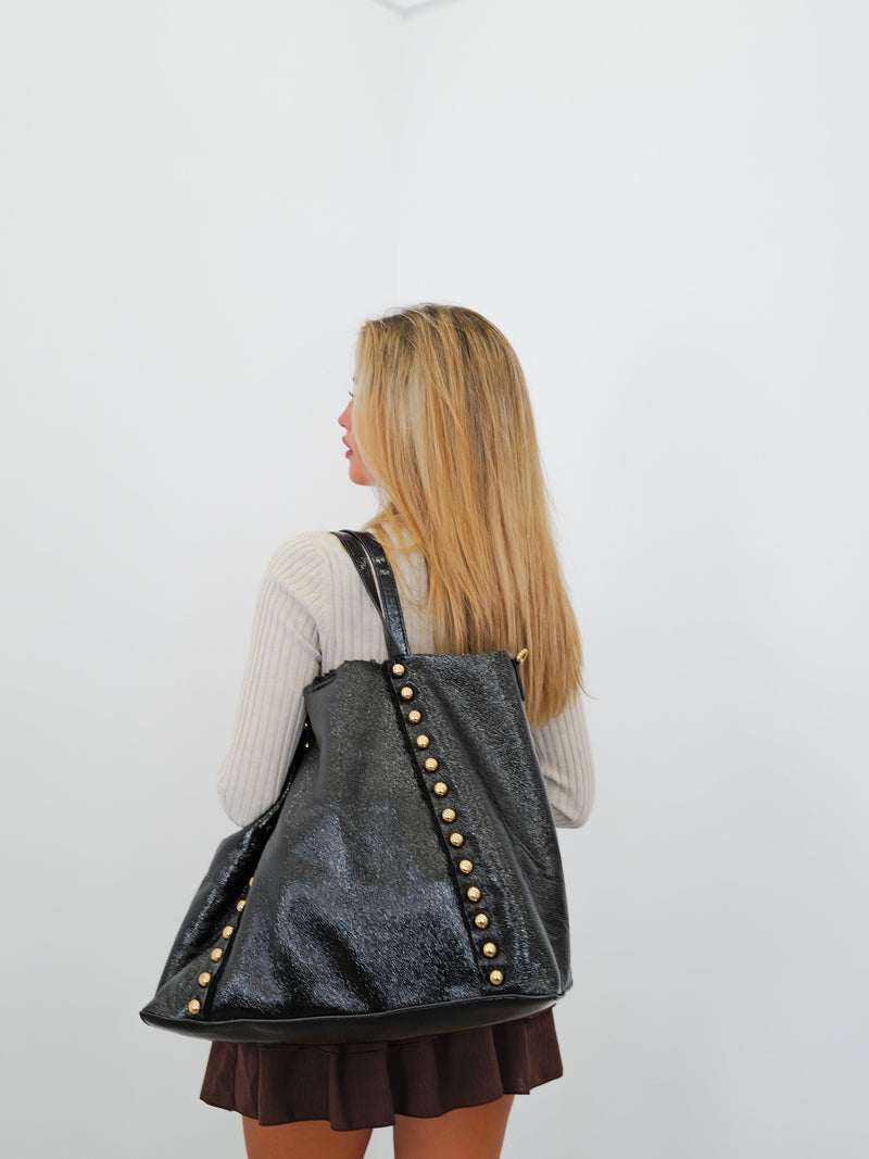 Bolso tachas brillo negro