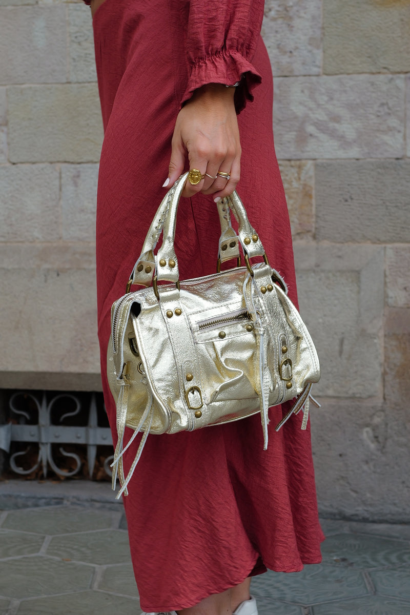 Bolso hebillas piel brillos dorado