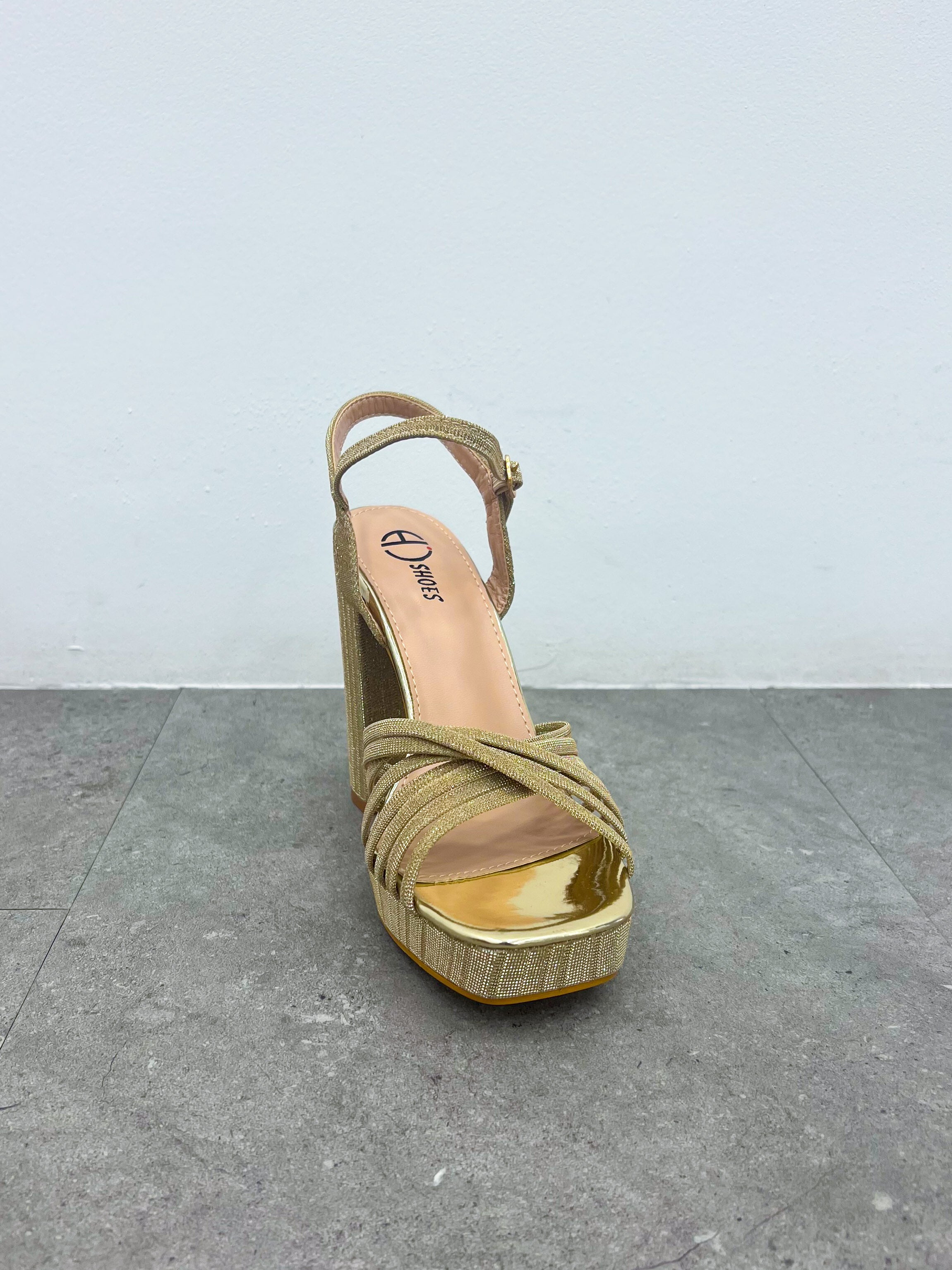 Sandalia entrelazado brillos dorado