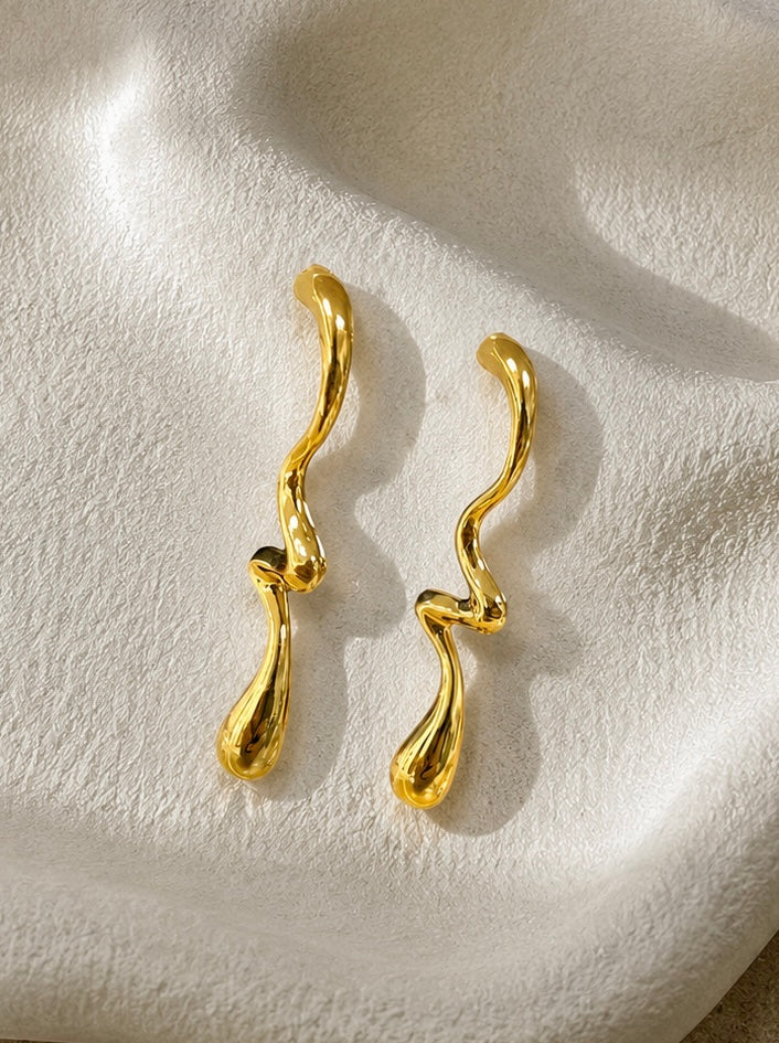BOUCLES D'OREILLES asymétrique dorées