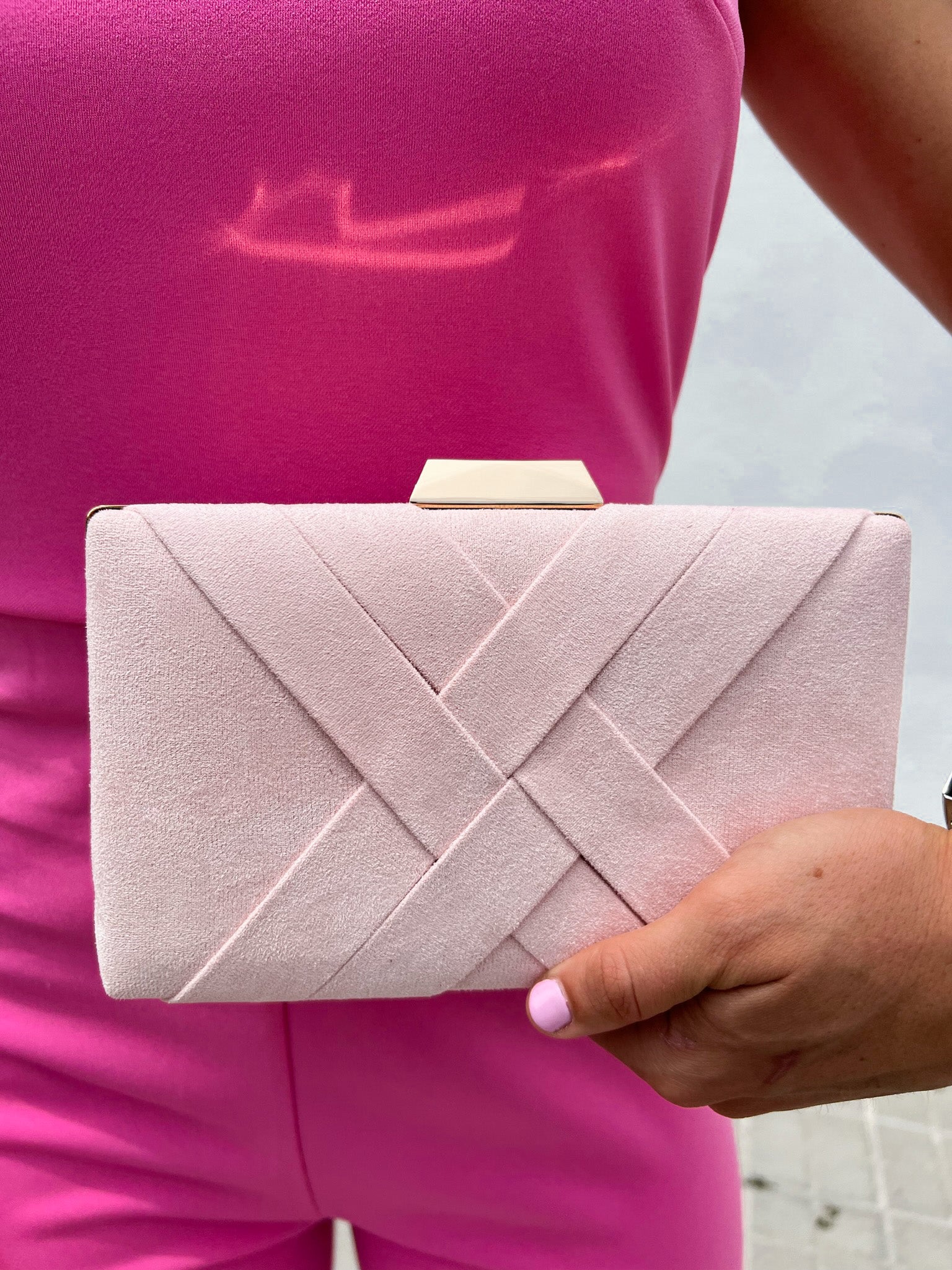 Clutch trenzado rosa