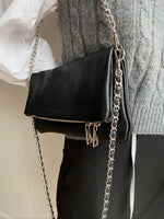 Bolso piel cadenas negro