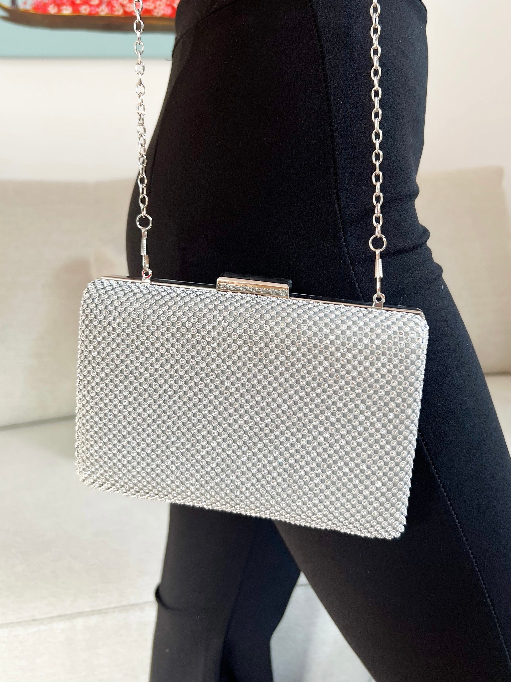 Clutch brillo plateado efecto