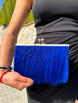 Blue fringed suede clutch