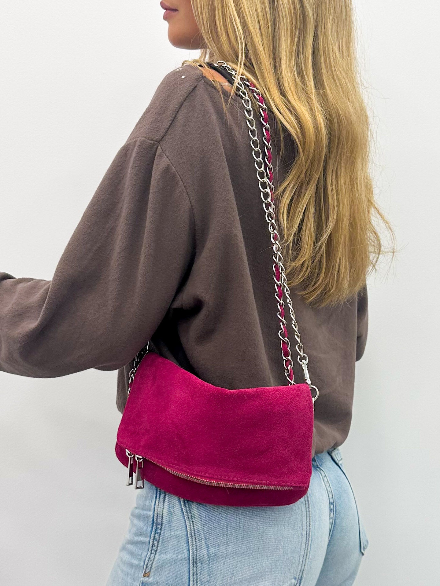 Fuchsia suede chain bag