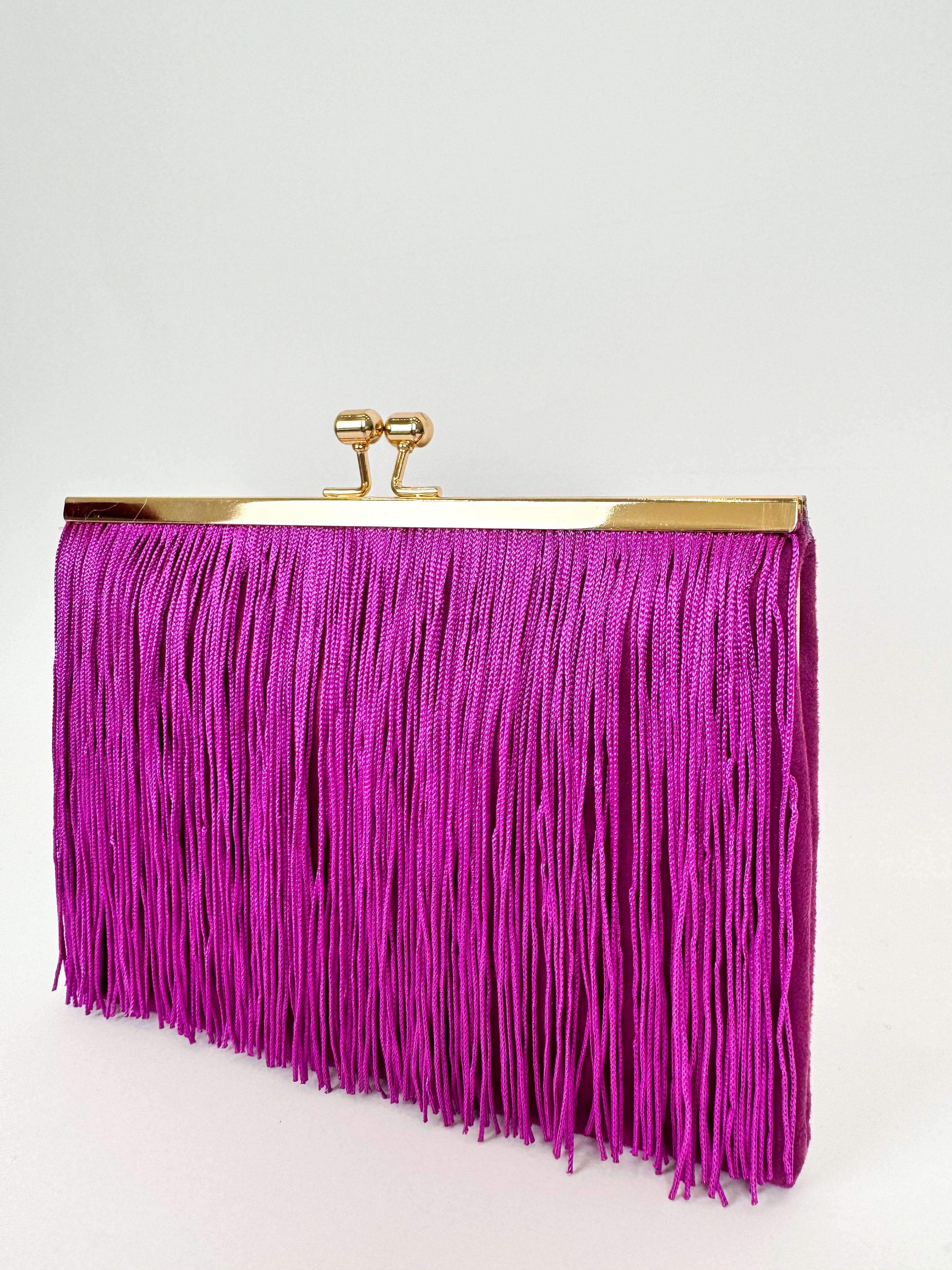 Yellow fringed suede clutch