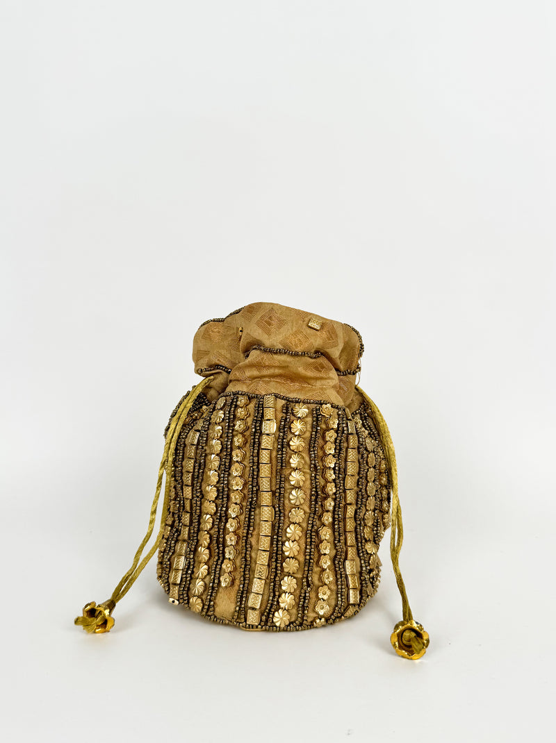 Clutch bag with golden ornaments