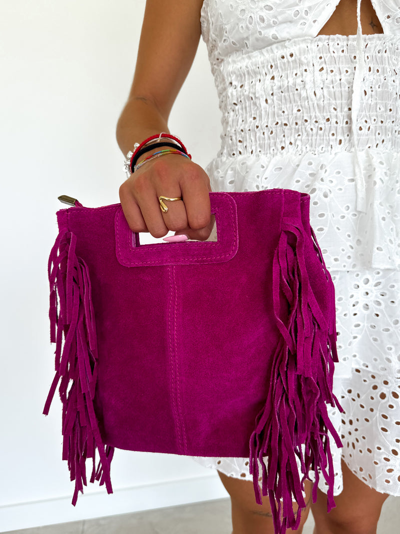 Fuchsia fringed leather bag