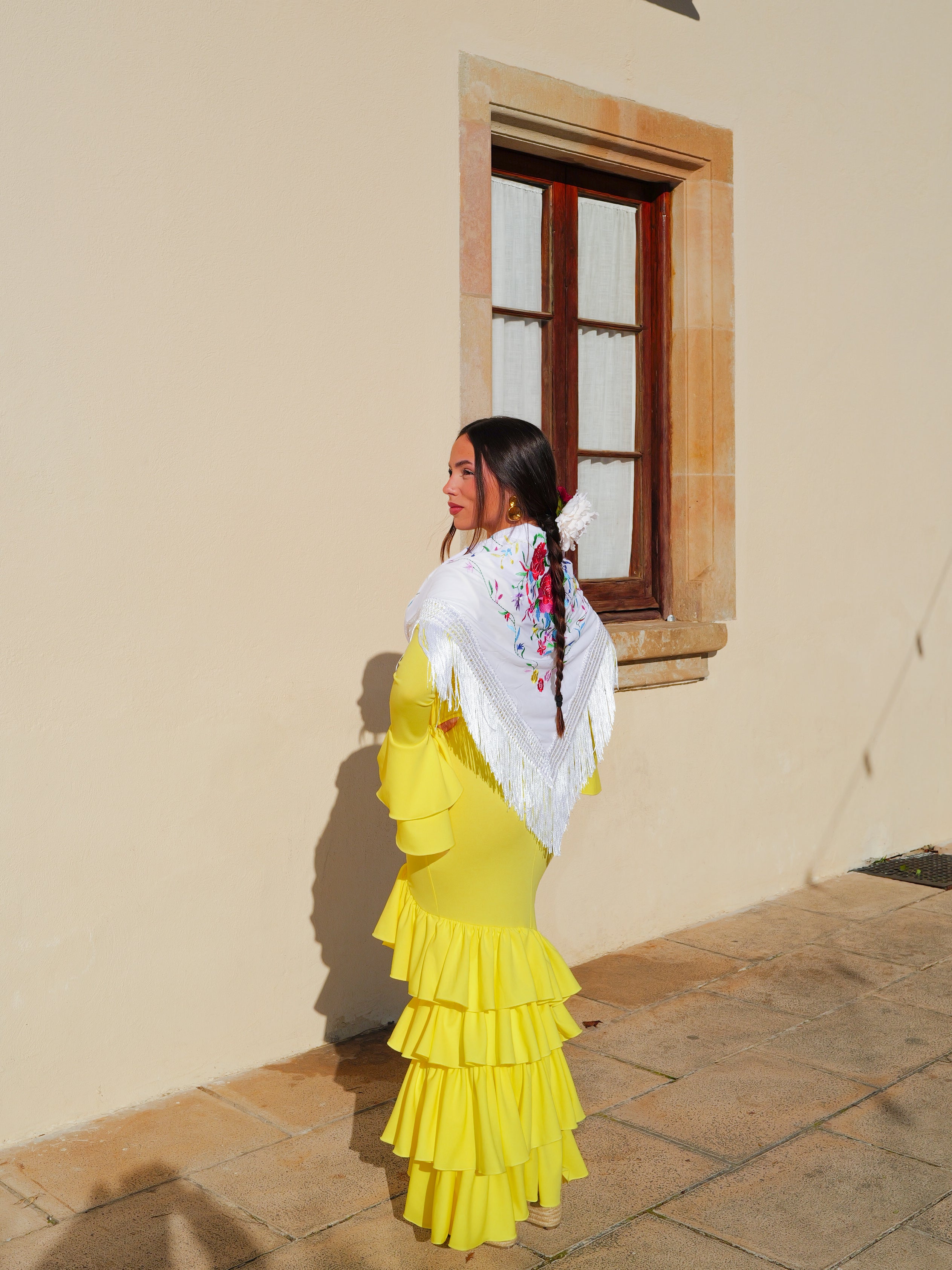 Asymmetrical yellow ruffled flamenco dress