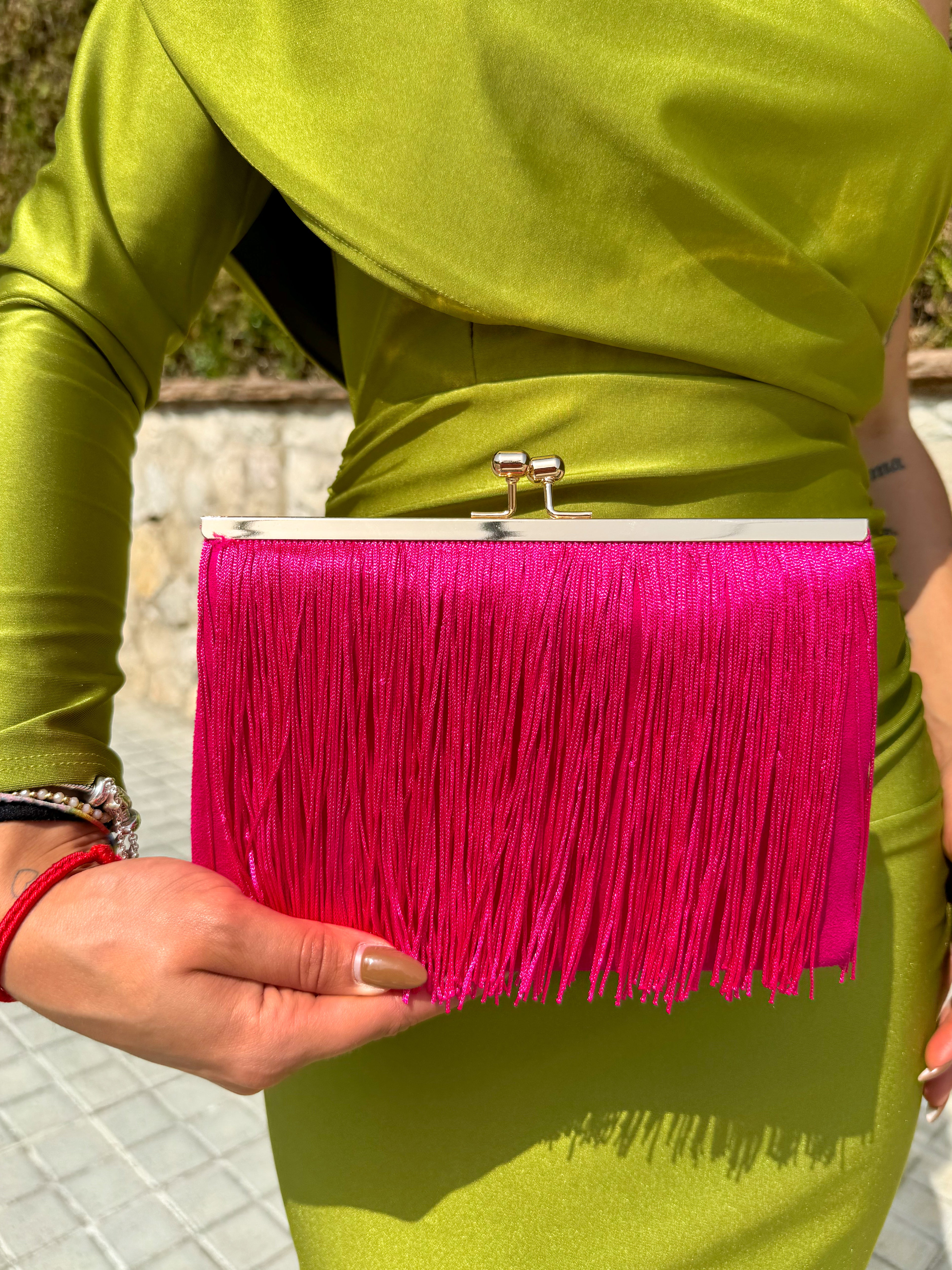 Fuchsia fringed suede clutch