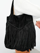 Black fringed suede bag